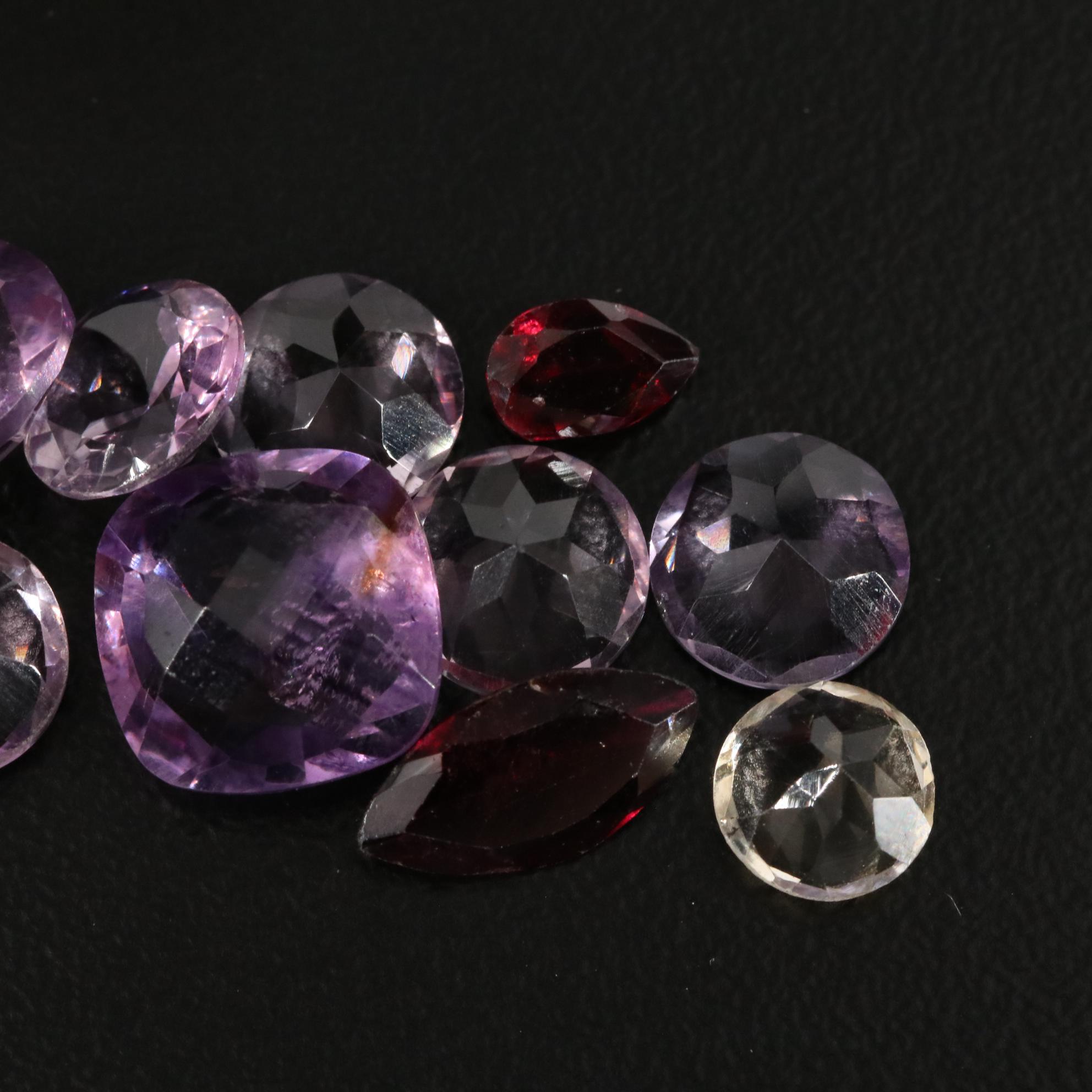 Loose 20.42 CTW Amethyst, Citrine, and Garnet Lot