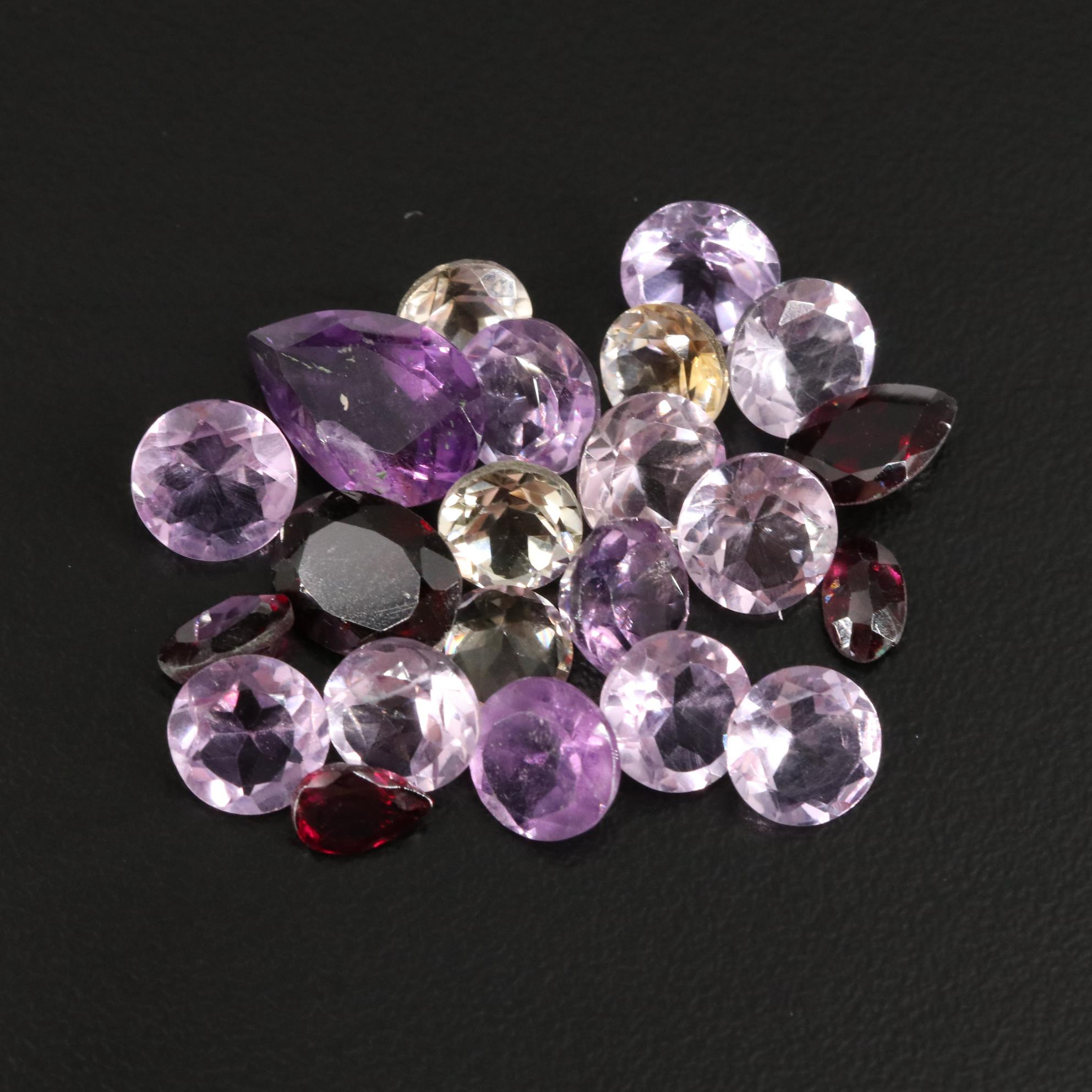 Loose 24.70 CTW Amethyst, Citrine, and Garnet Lot