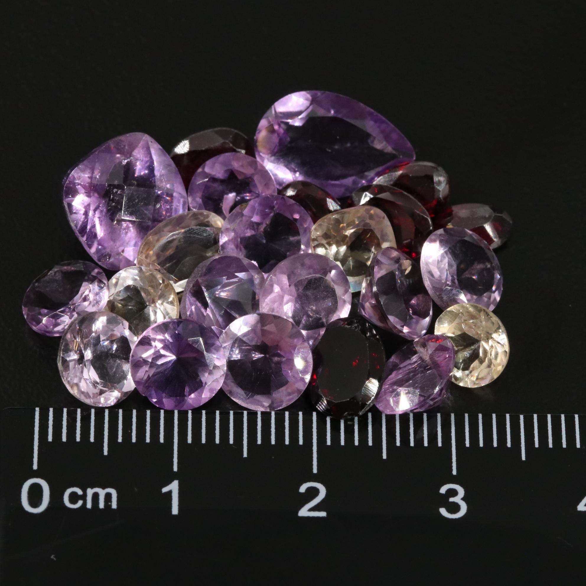 Loose 25.45 CTW Amethyst, Citrine, and Garnet Lot
