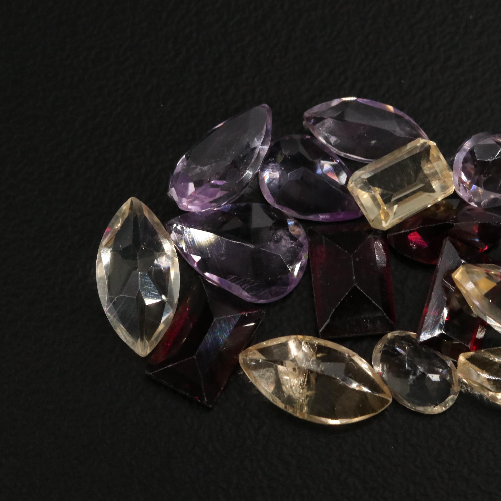 Loose 20.75 CTW Amethyst, Citrine, and Garnet Lot