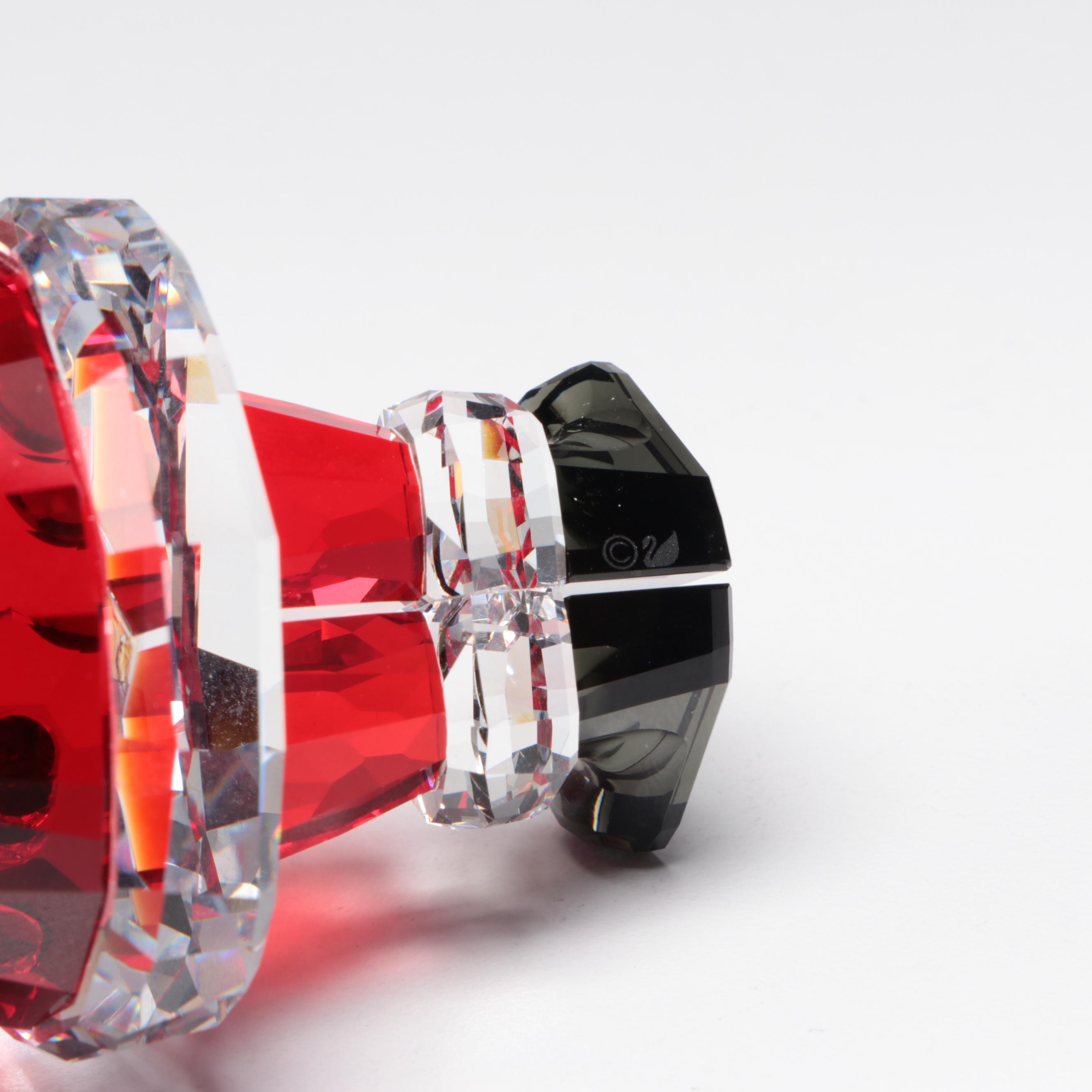 Swarovski Crystal Santa Claus, Reindeer, Sleigh, and Dog Figurines