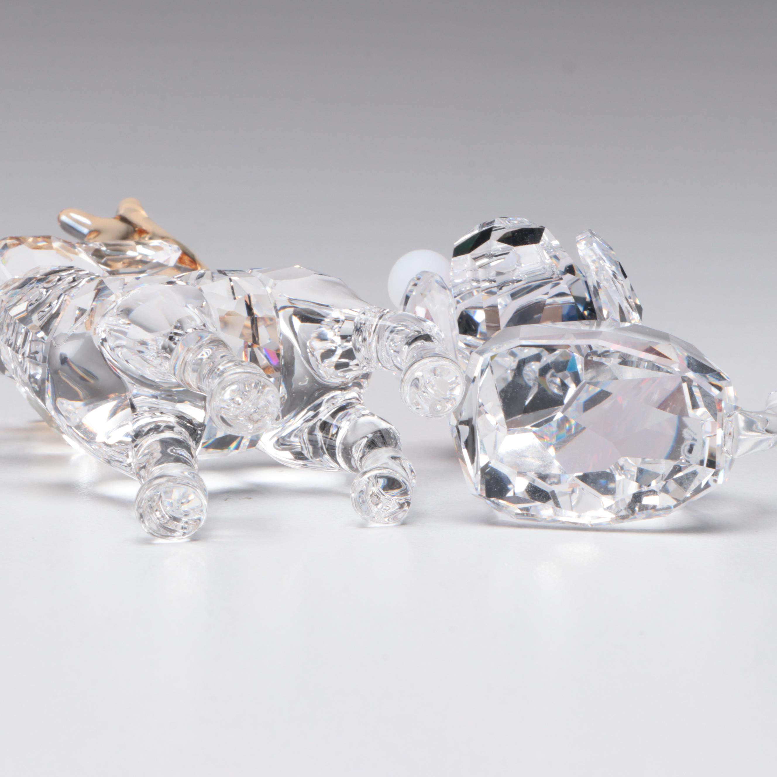 Swarovski Crystal Santa Claus, Reindeer, Sleigh, and Dog Figurines