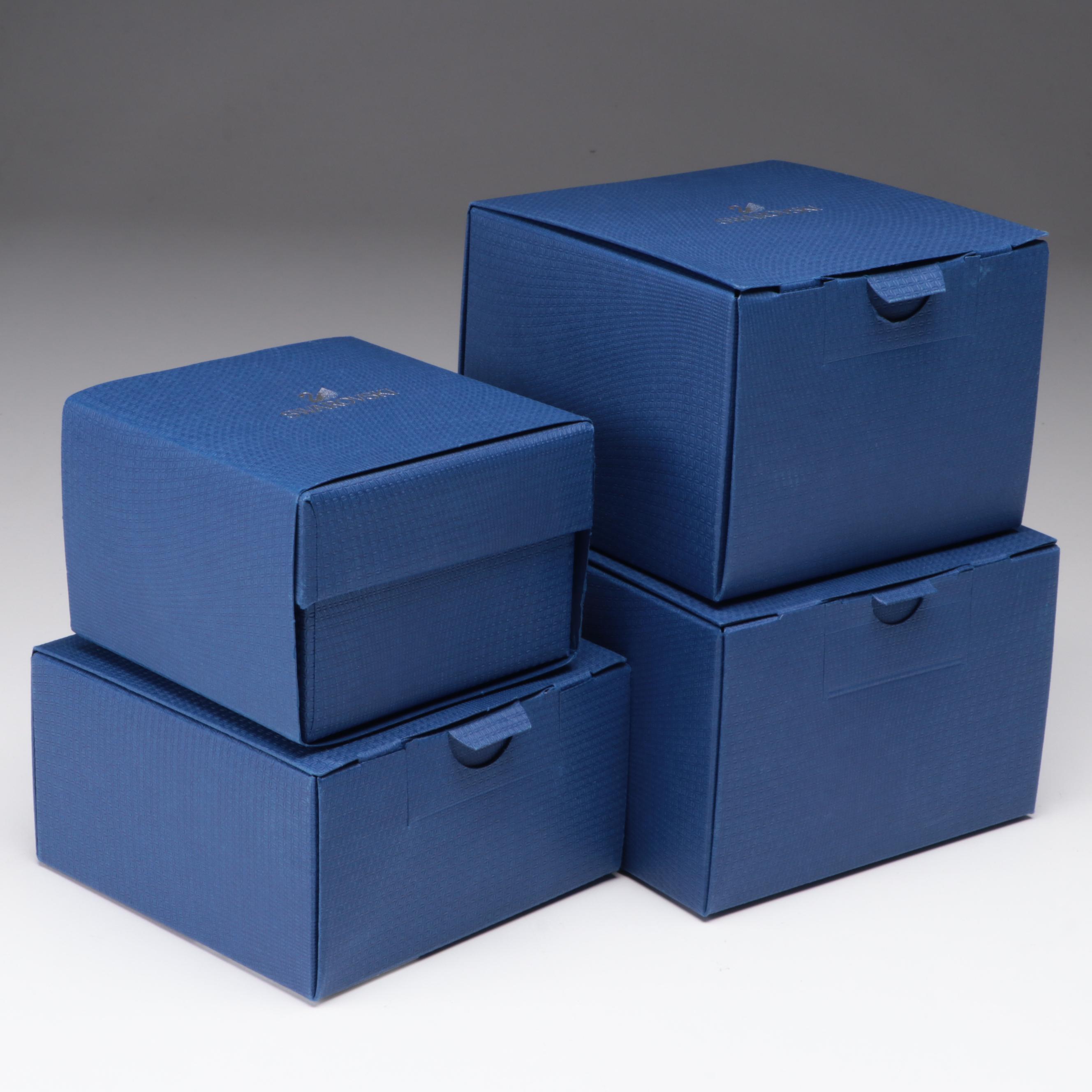 Swarovski Crystal Santa Claus, Reindeer, Sleigh, and Dog Figurines