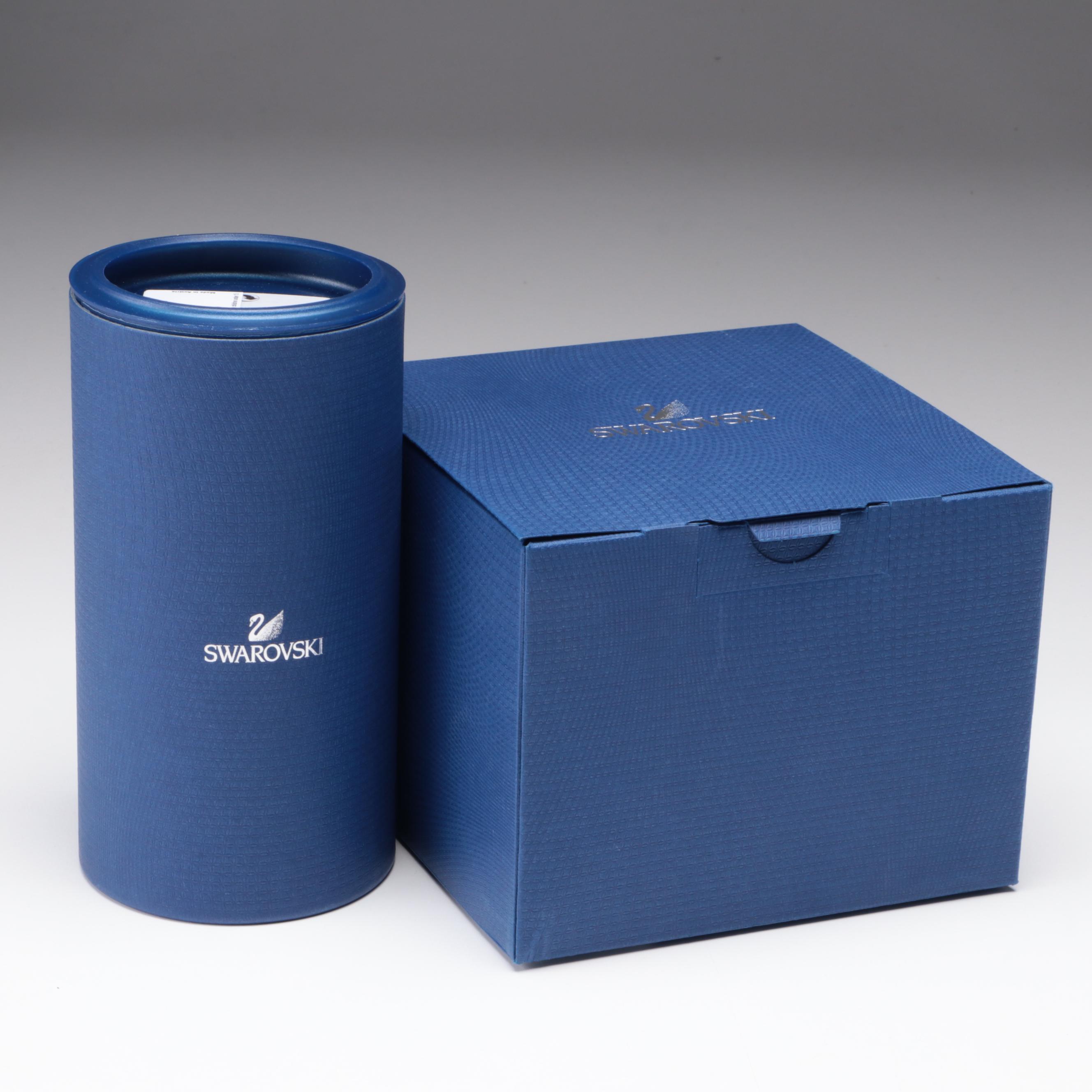 Swarovski Crystal Nutcracker and Poinsettia Figurines