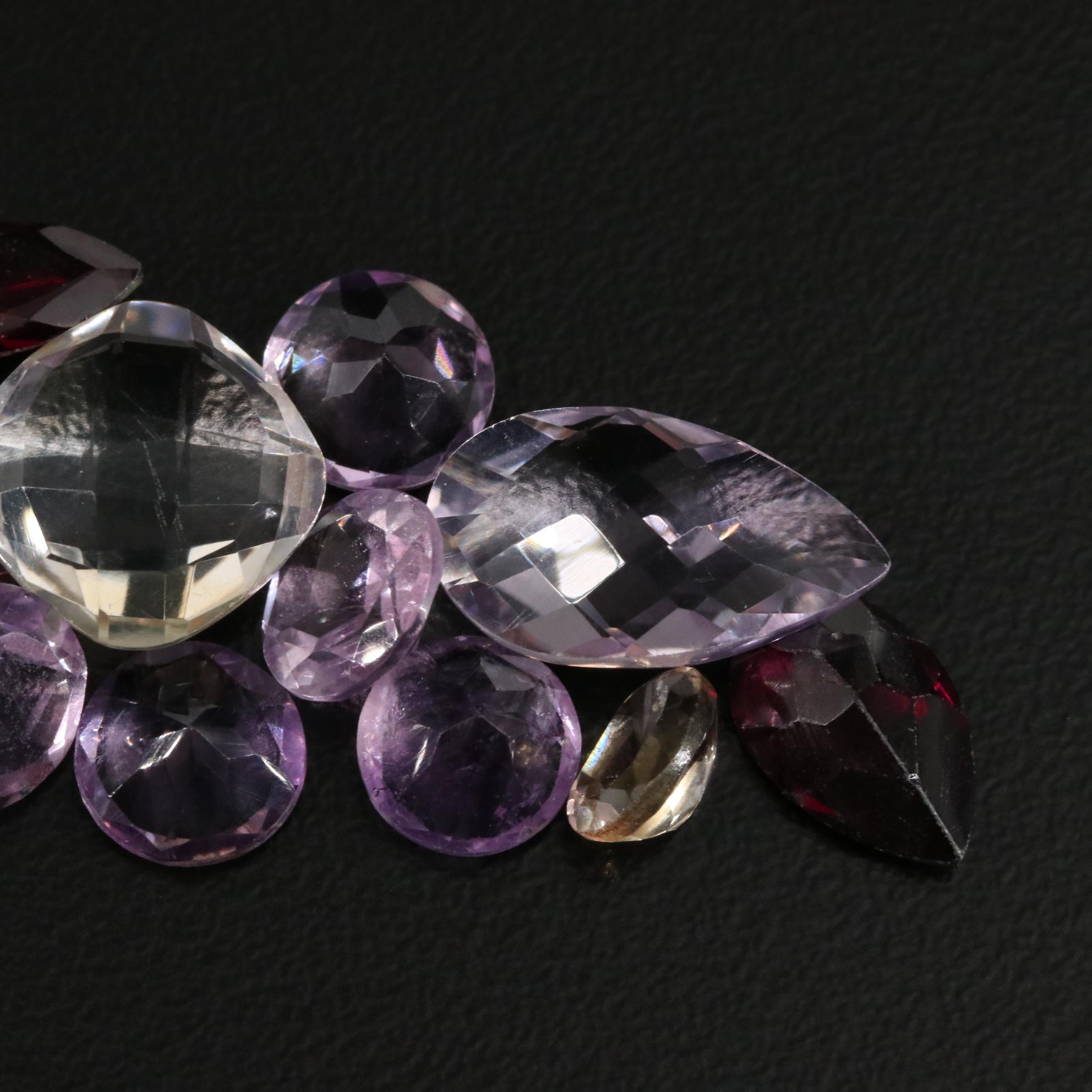 Loose 22.90 CTW Amethyst, Citrine, Garnet, and Others Lot