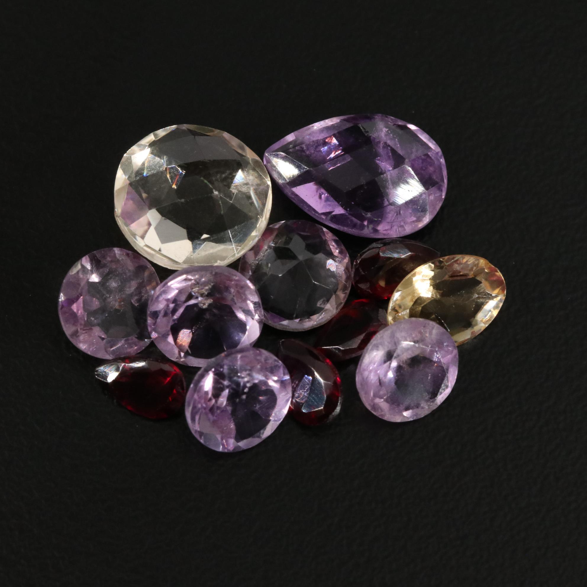 Loose 15.25 CTW Amethyst, Citrine, and Garnet Lot