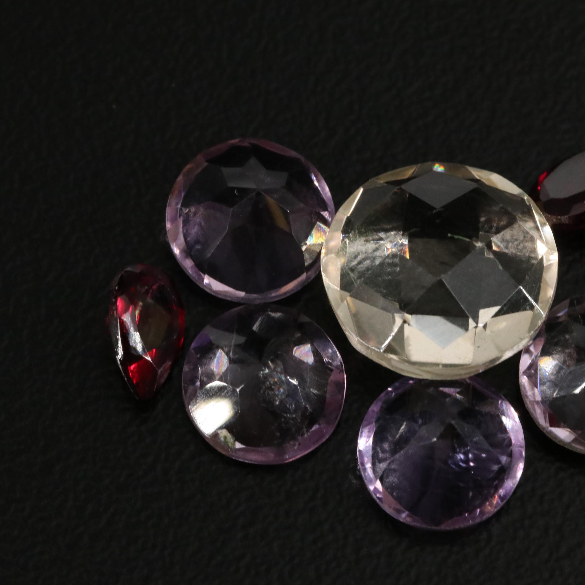 Loose 15.25 CTW Amethyst, Citrine, and Garnet Lot