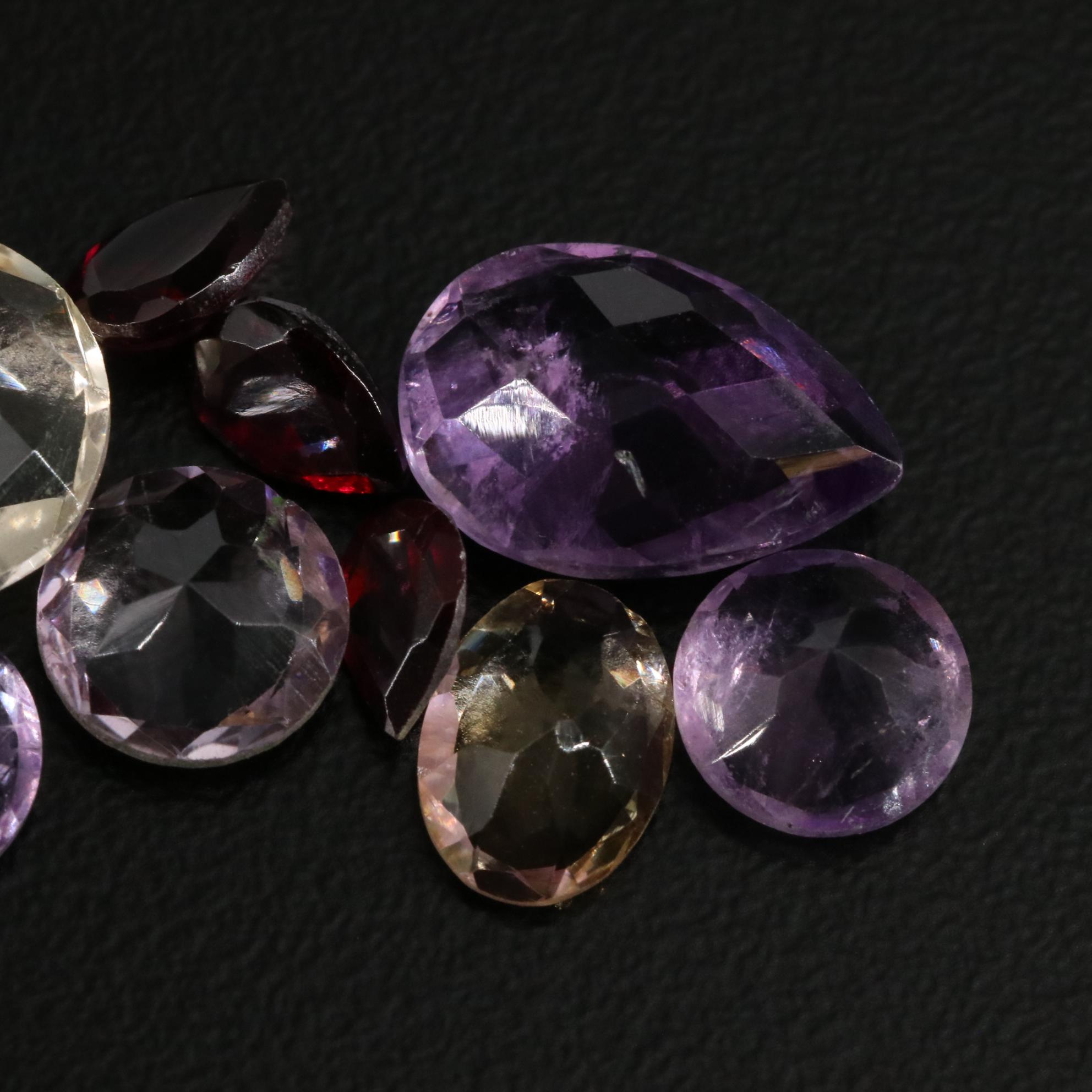 Loose 15.25 CTW Amethyst, Citrine, and Garnet Lot