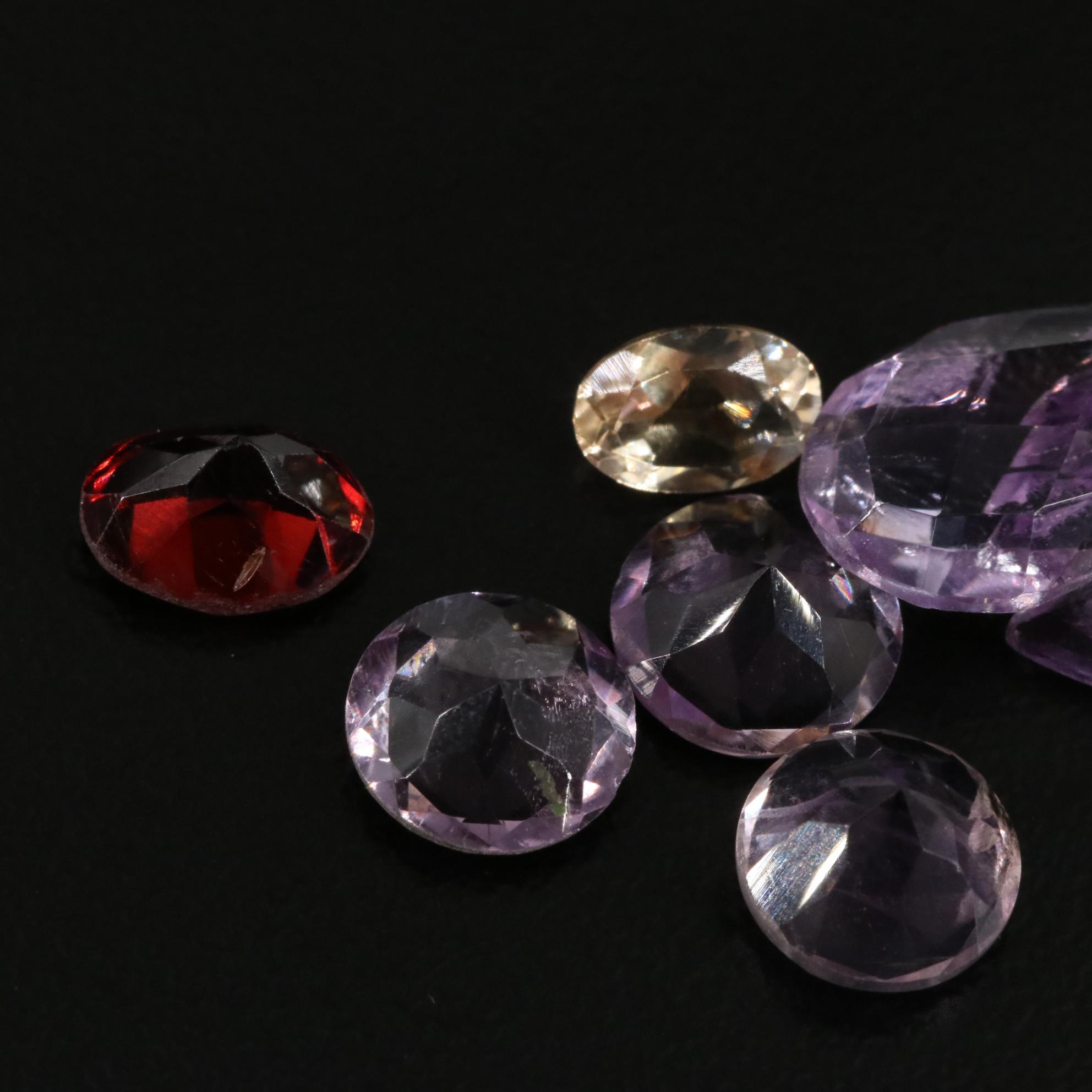 Loose 17.40 CTW Amethyst, Citrine, Garnet, and Others Lot