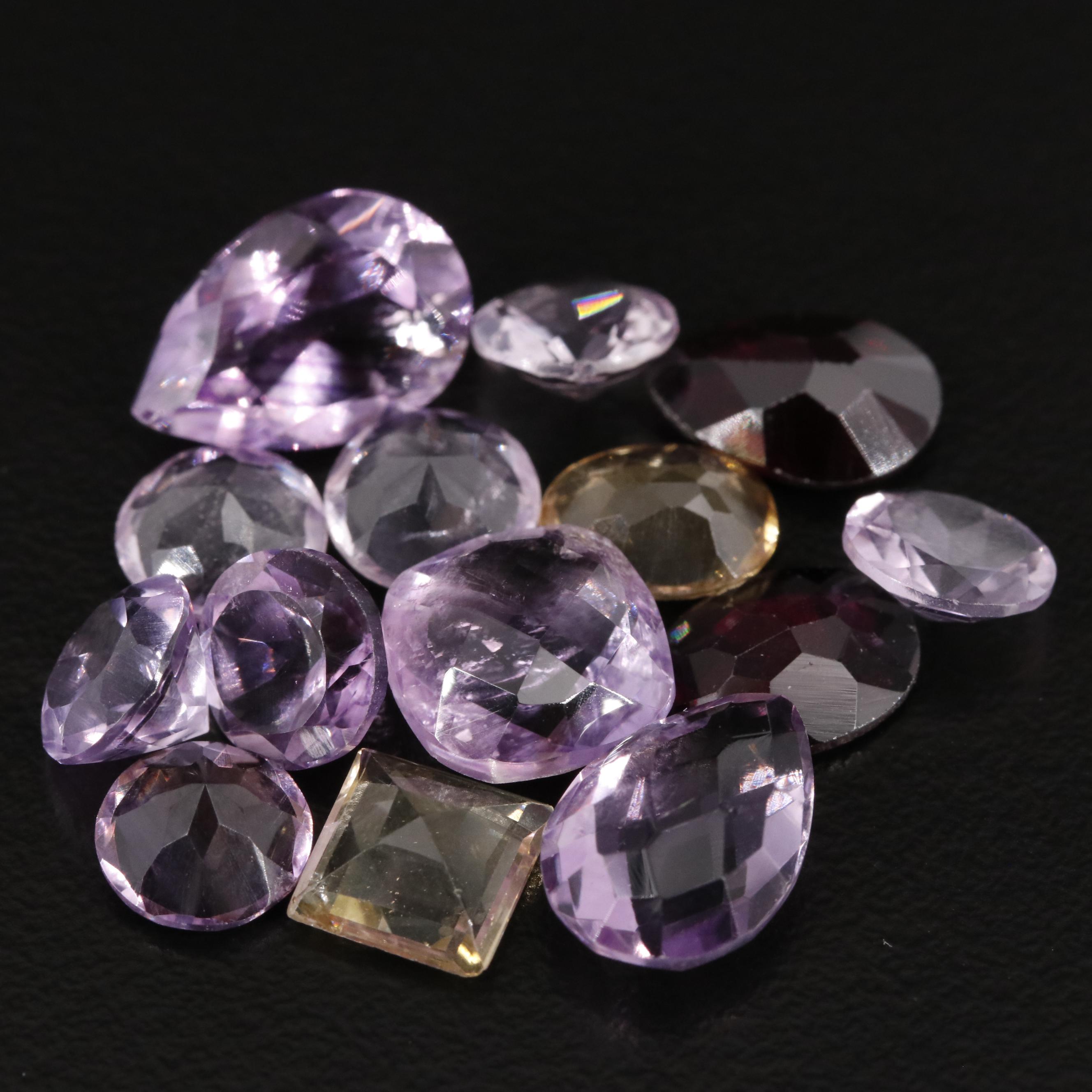 Loose 21.72 CTW Amethyst, Citrine, and Garnet Lot