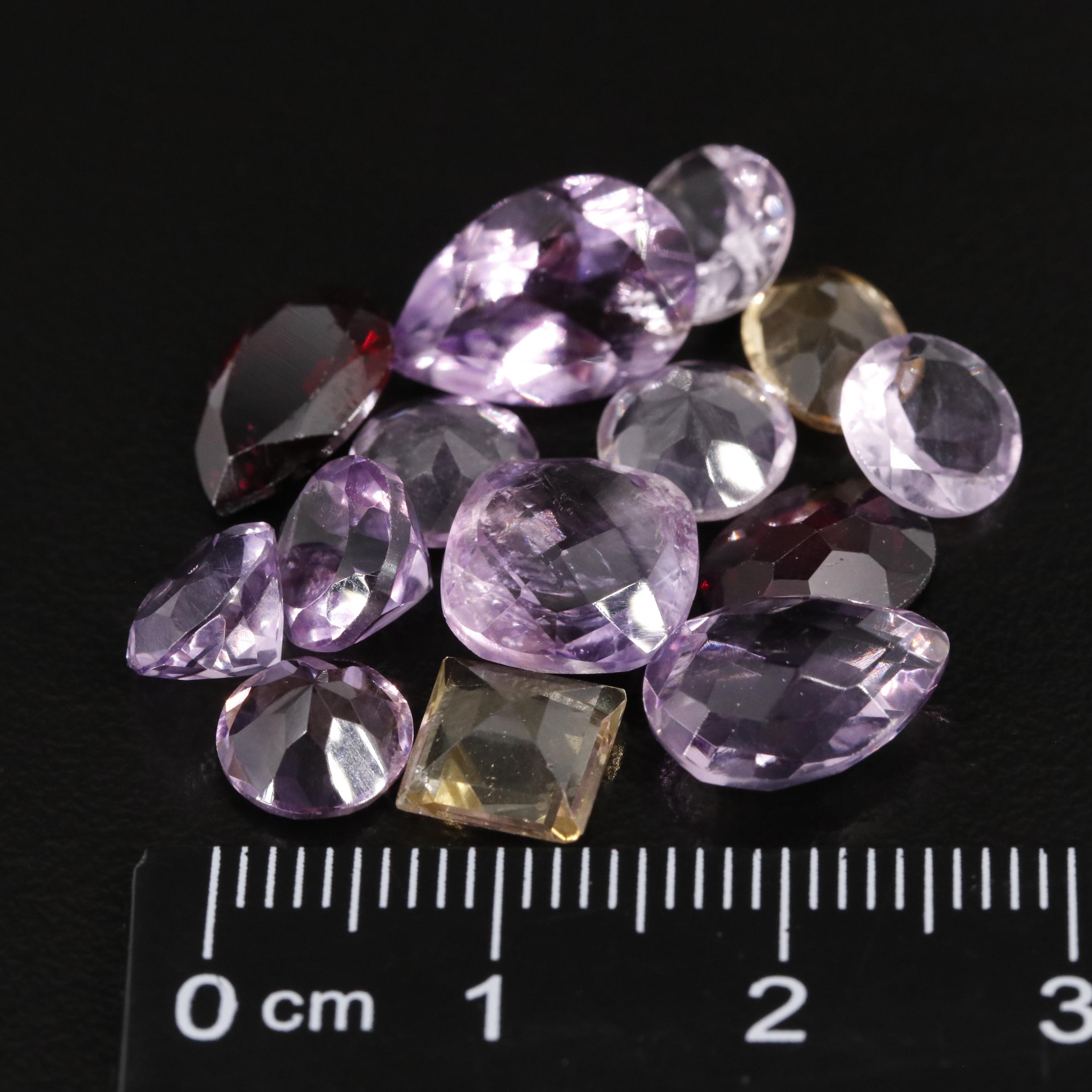Loose 21.72 CTW Amethyst, Citrine, and Garnet Lot