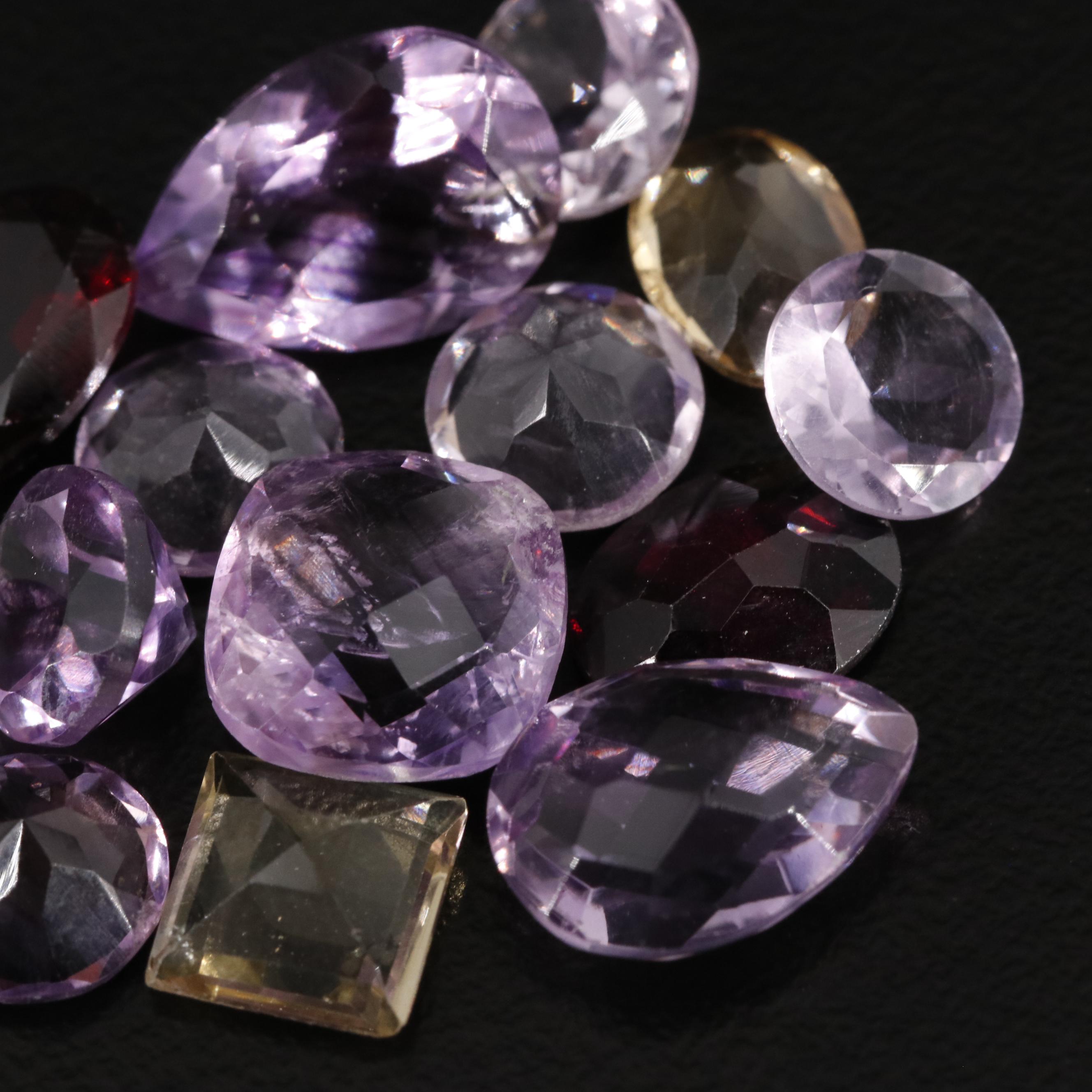 Loose 21.72 CTW Amethyst, Citrine, and Garnet Lot