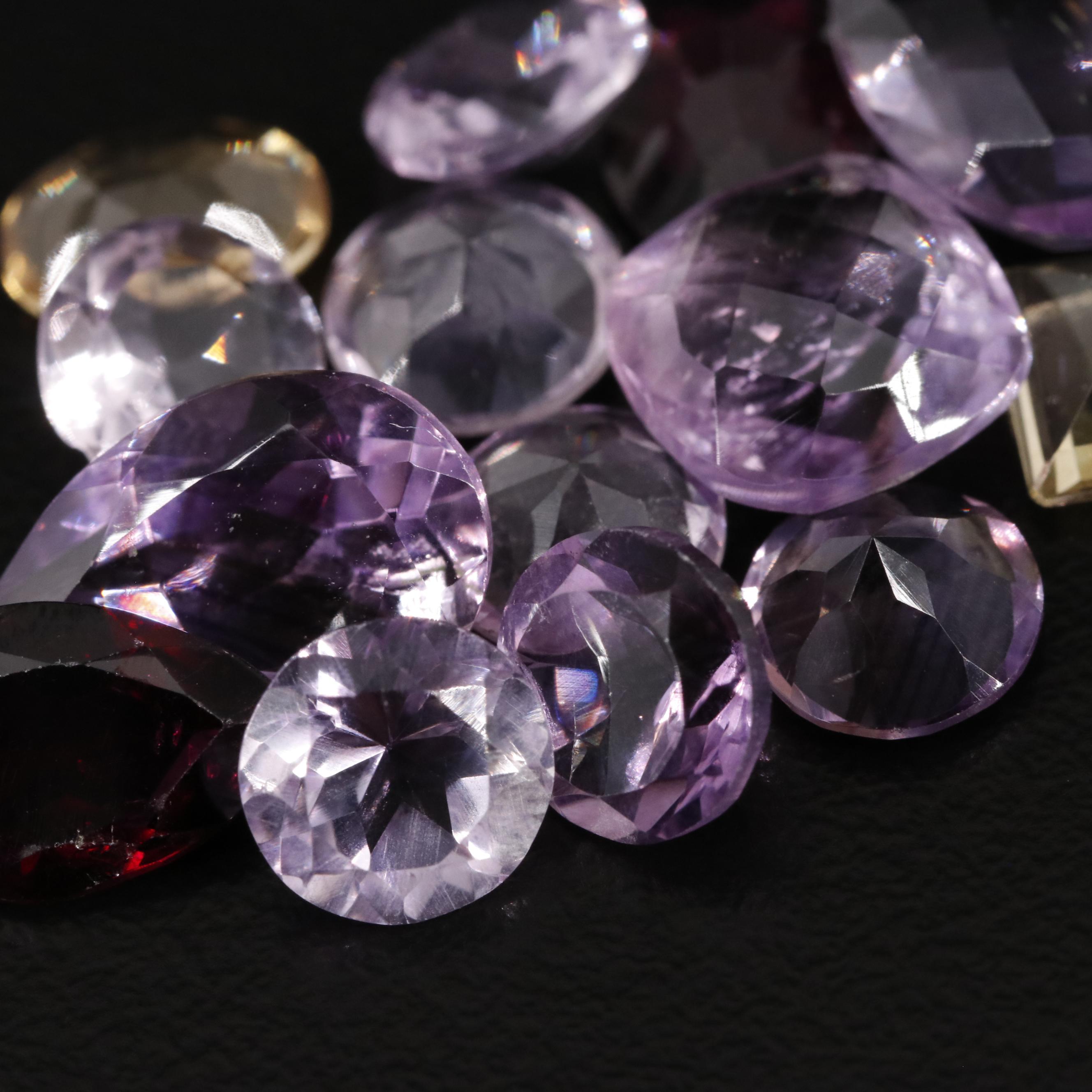 Loose 21.72 CTW Amethyst, Citrine, and Garnet Lot