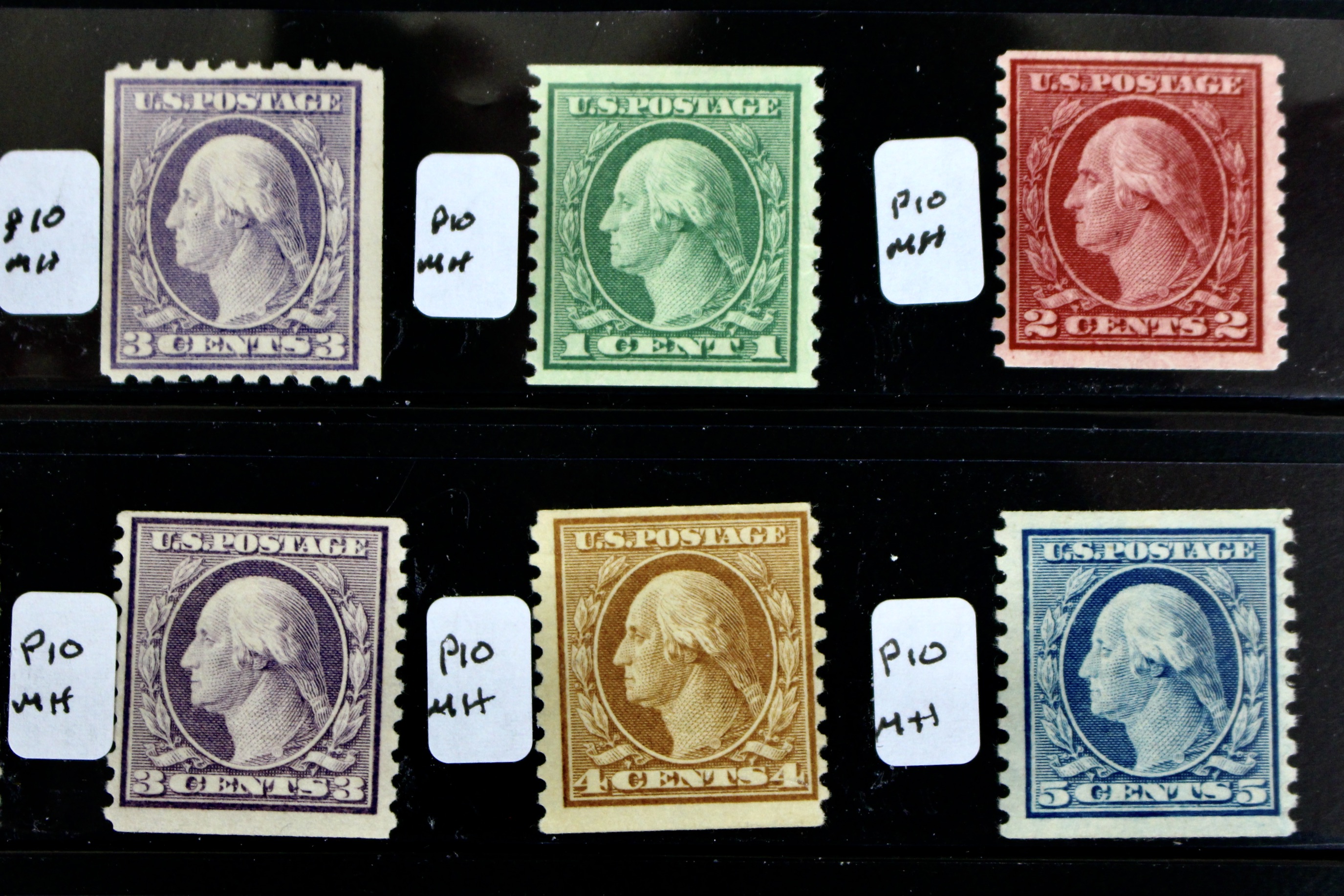 Thirty-Two Mint Hinged Washington and Franklin U.S. Postage Stamps