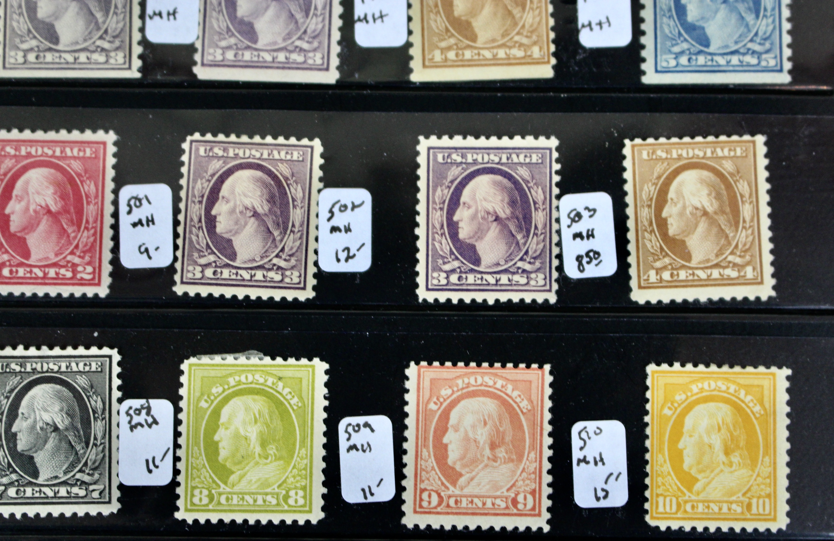 Thirty-Two Mint Hinged Washington and Franklin U.S. Postage Stamps