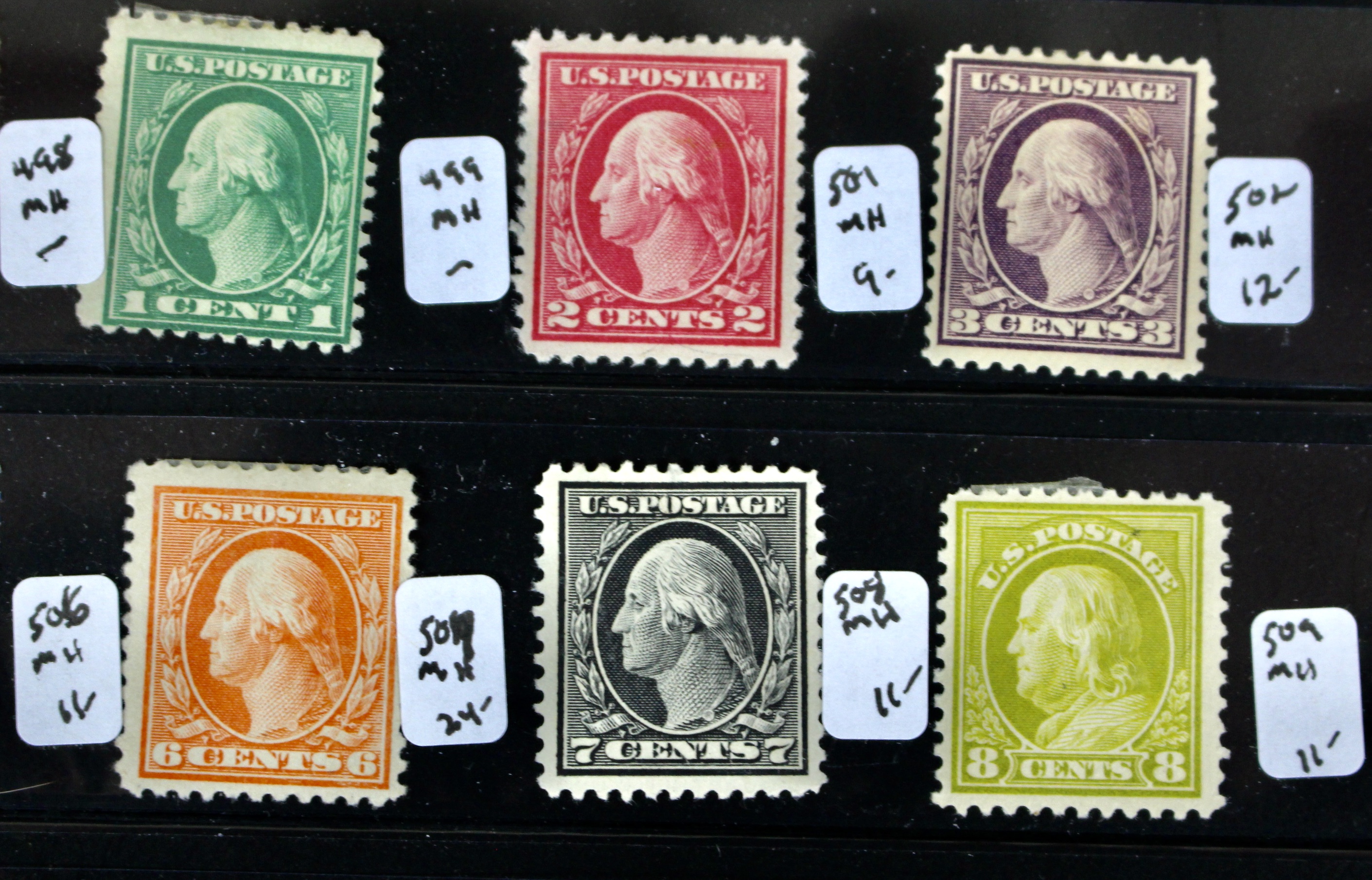 Thirty-Two Mint Hinged Washington and Franklin U.S. Postage Stamps