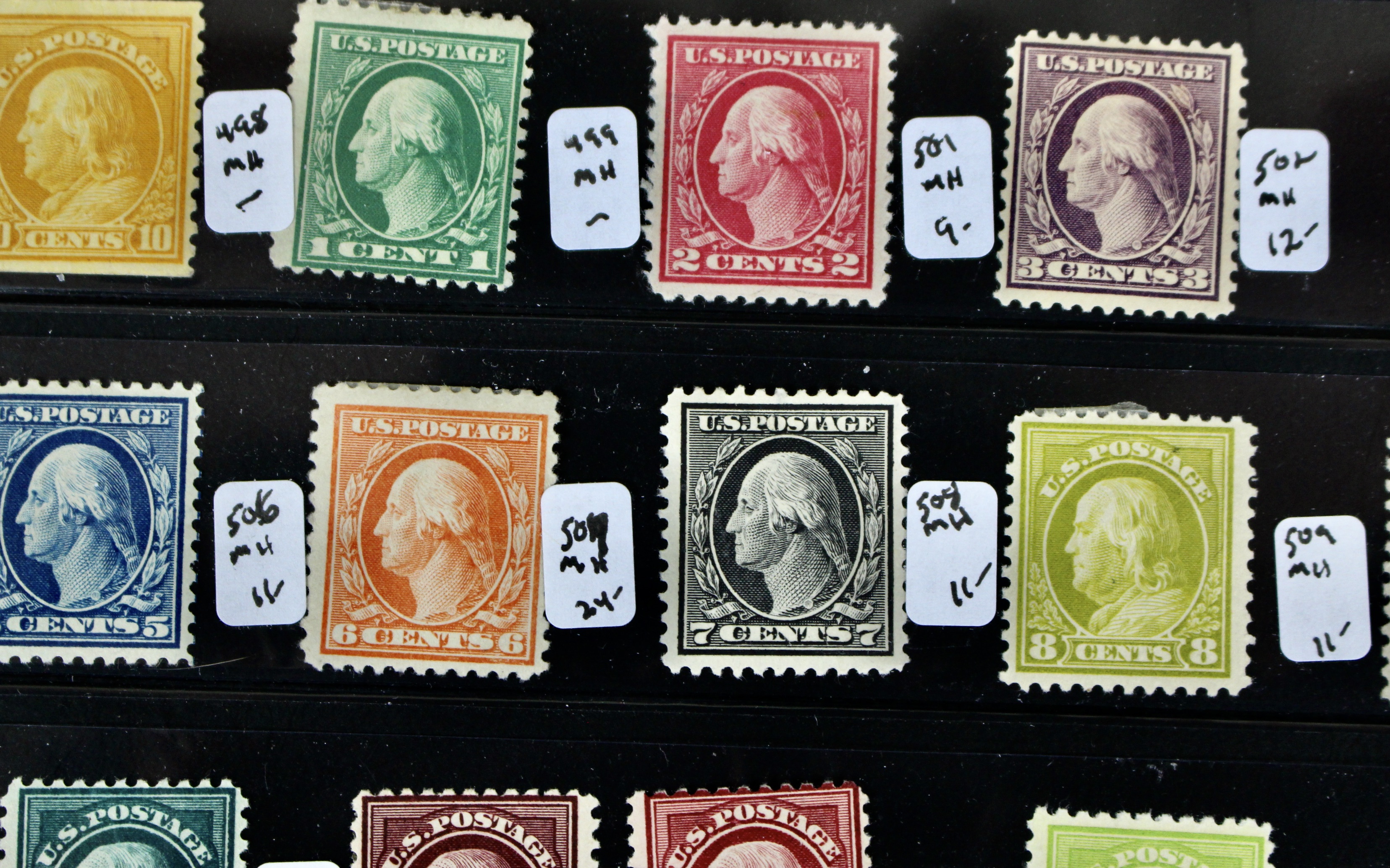 Thirty-Two Mint Hinged Washington and Franklin U.S. Postage Stamps