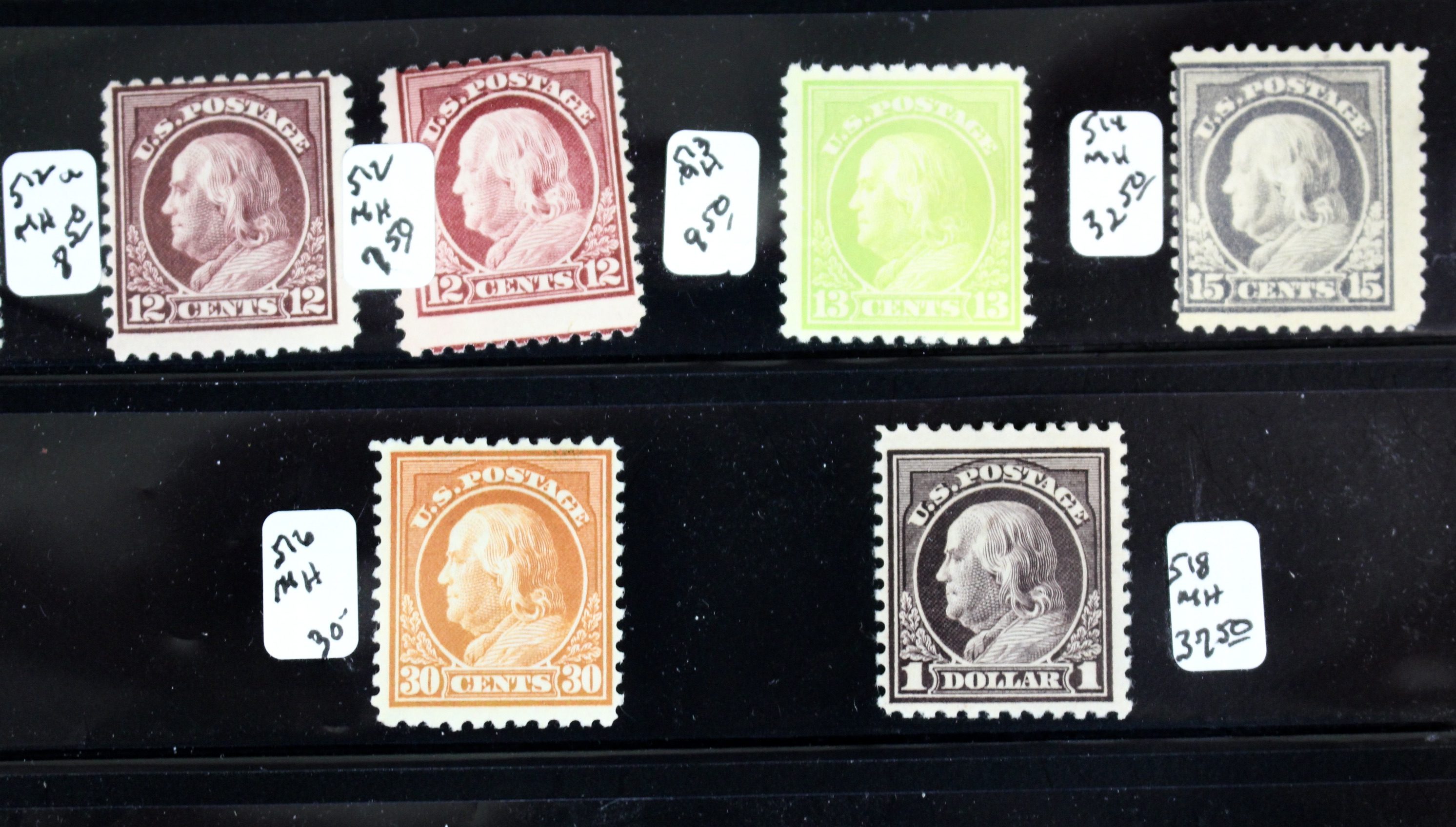 Thirty-Two Mint Hinged Washington and Franklin U.S. Postage Stamps