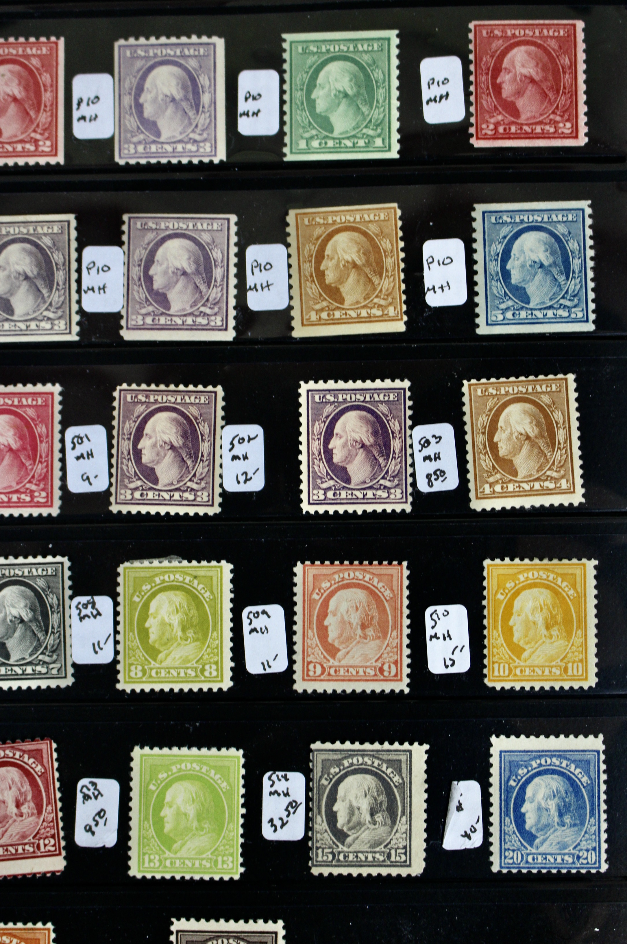 Thirty-Two Mint Hinged Washington and Franklin U.S. Postage Stamps