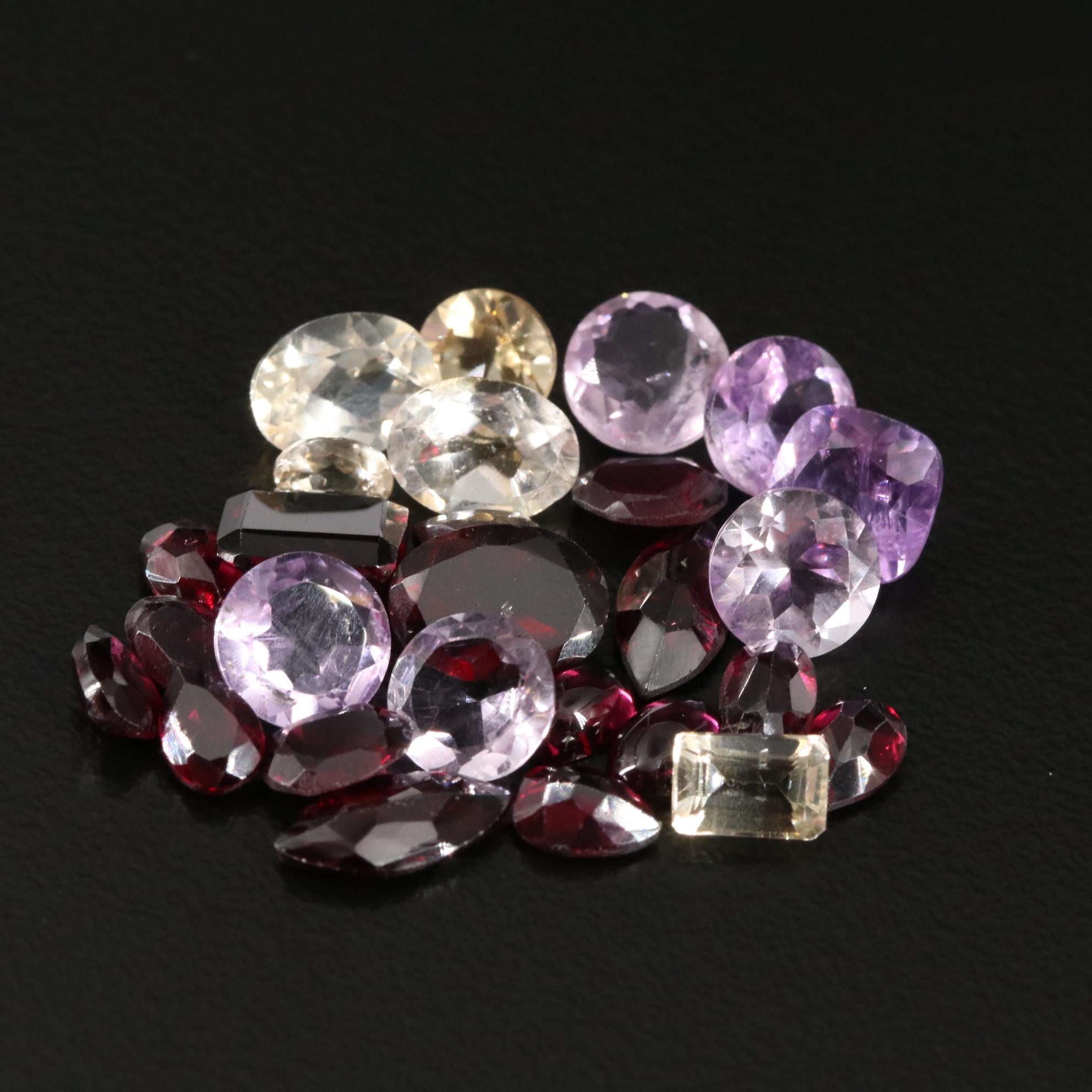 Loose 23.85 CTW Amethyst, Citrine, and Garnet Lot