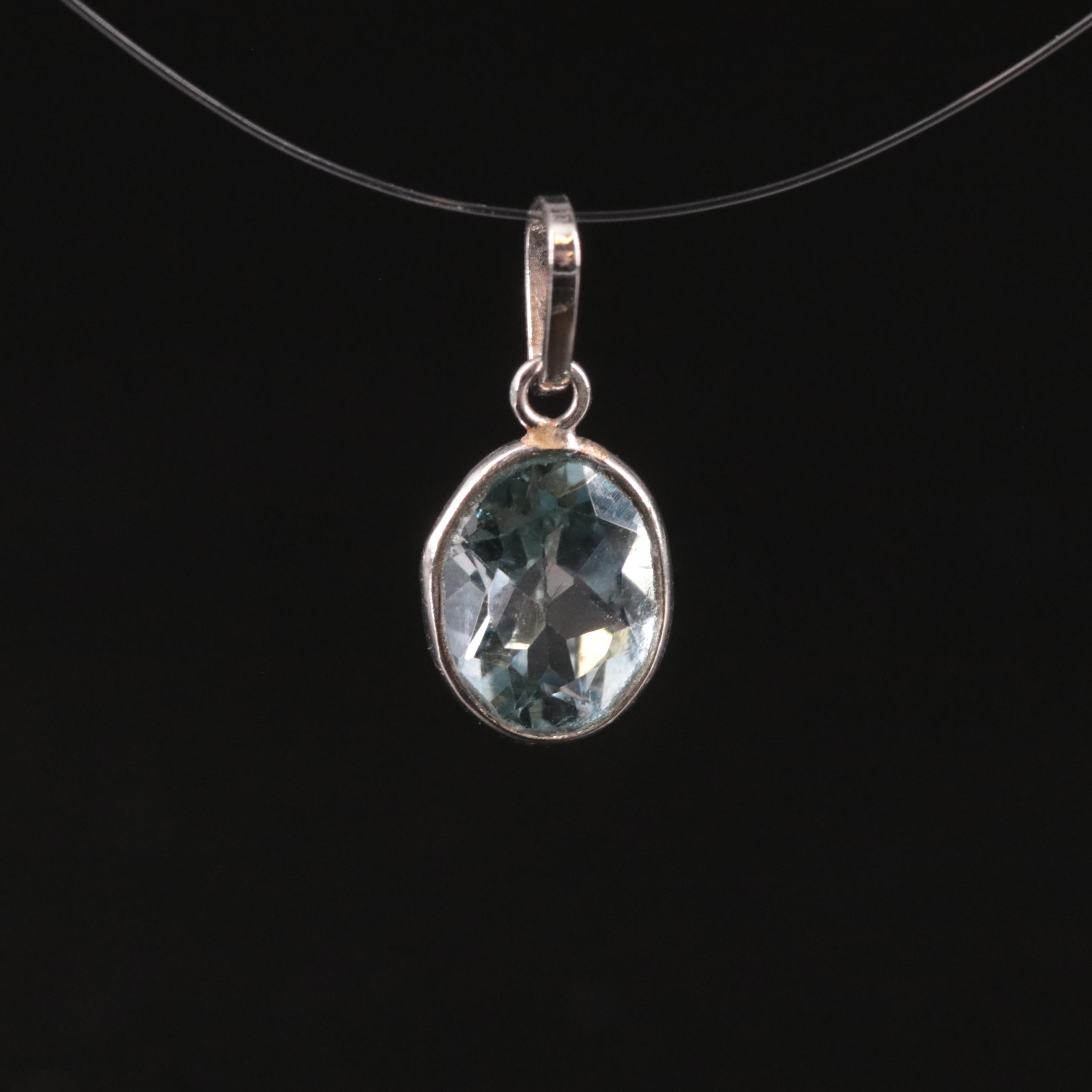 14K Blue Topaz Pendant