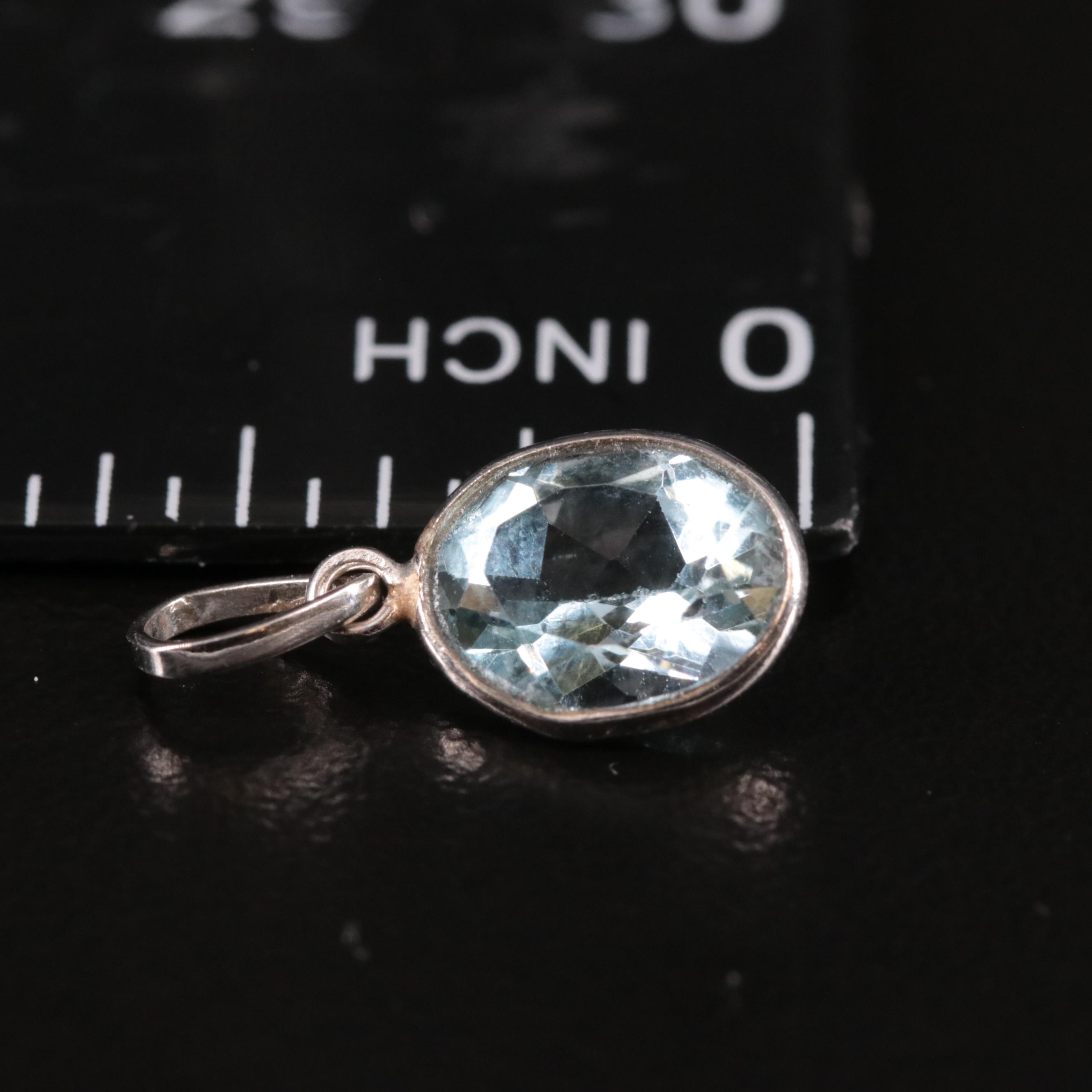 14K Blue Topaz Pendant