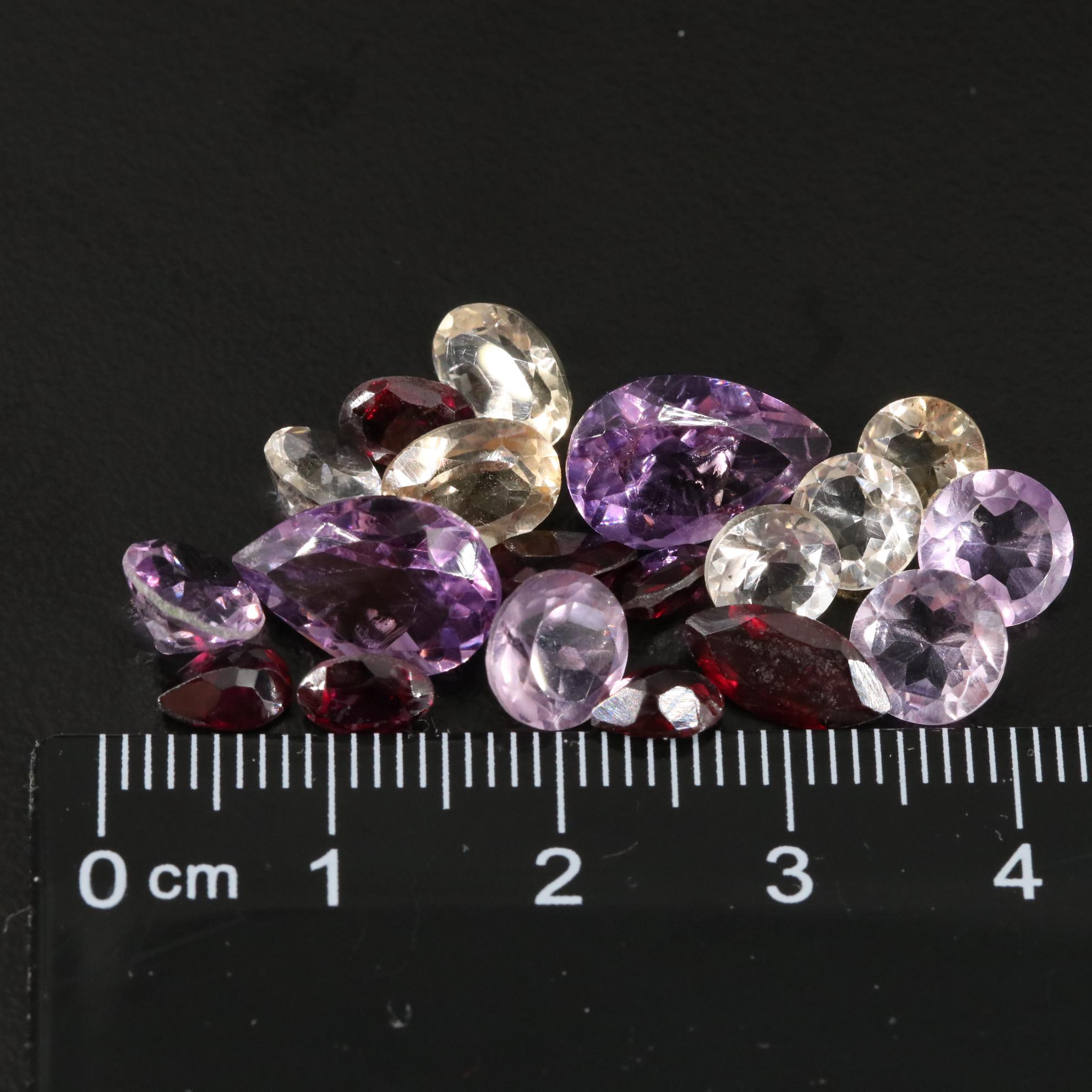 Loose 20.65 CTW Amethyst, Citrine, and Garnet Lot