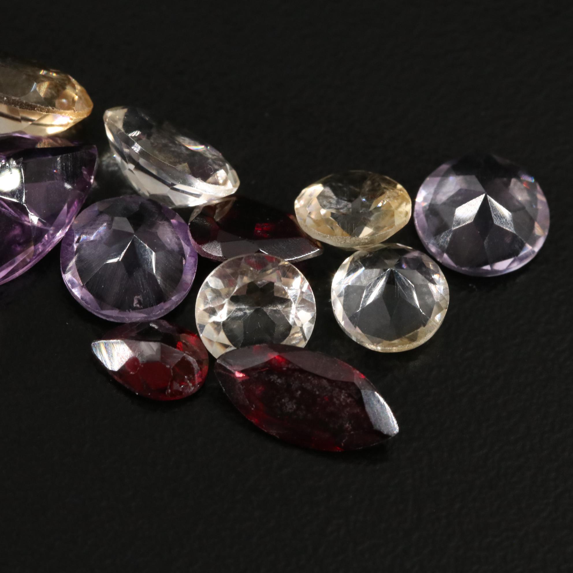 Loose 20.65 CTW Amethyst, Citrine, and Garnet Lot