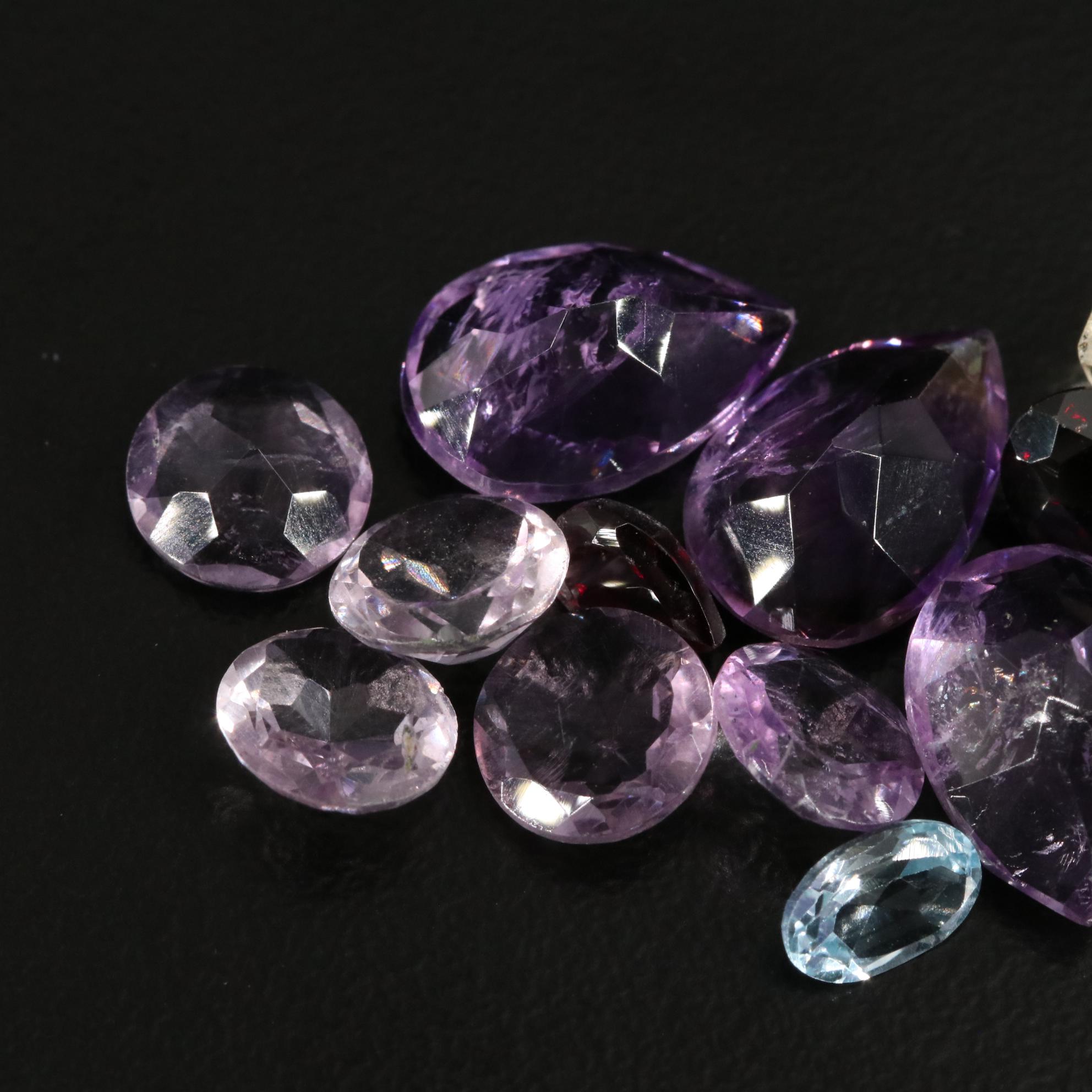 Loose 23.18 CTW Amethyst, Citrine, and Garnet Lot