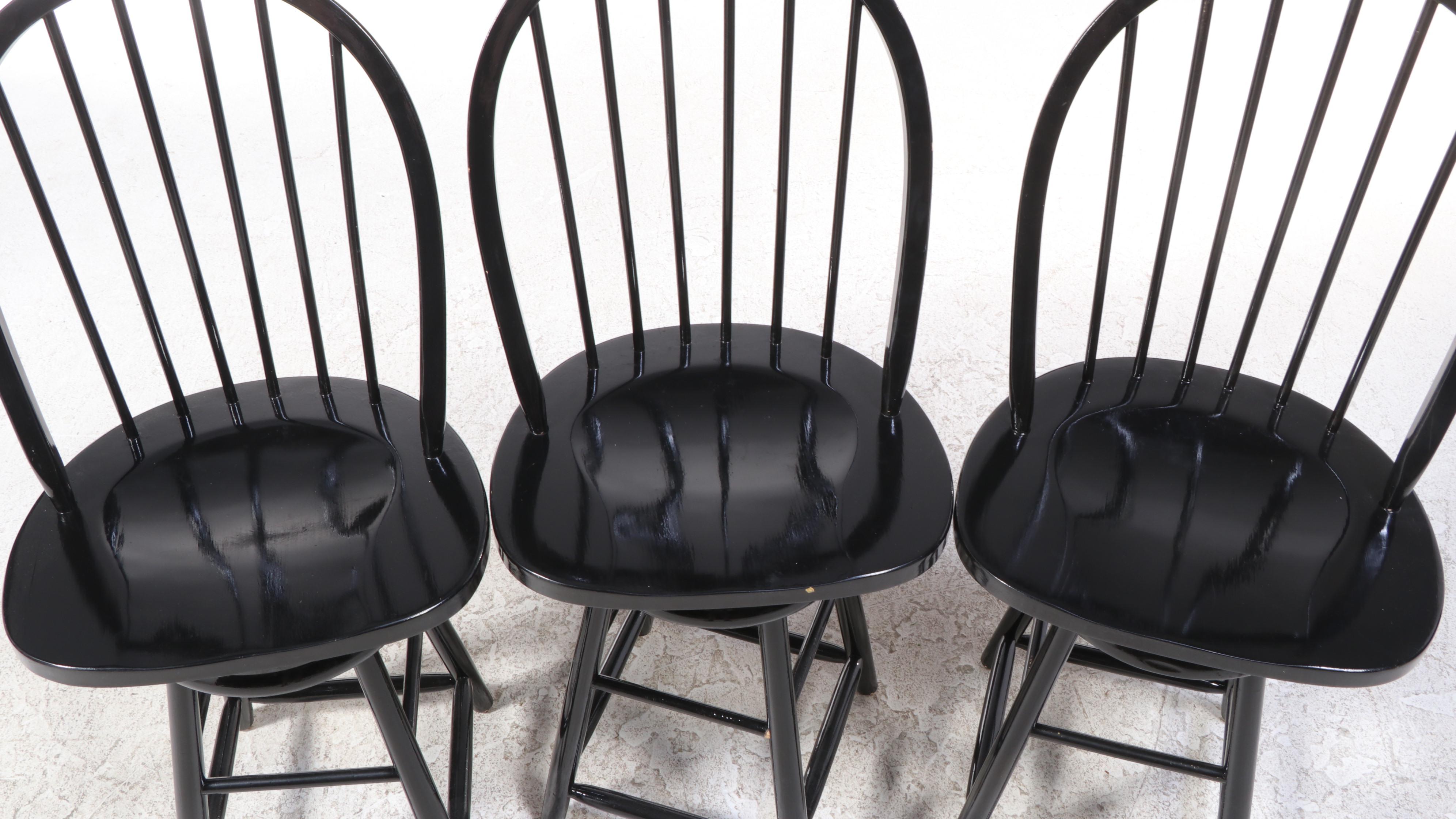 Three Windsor Style Ebonized Wood Swivel Barstools