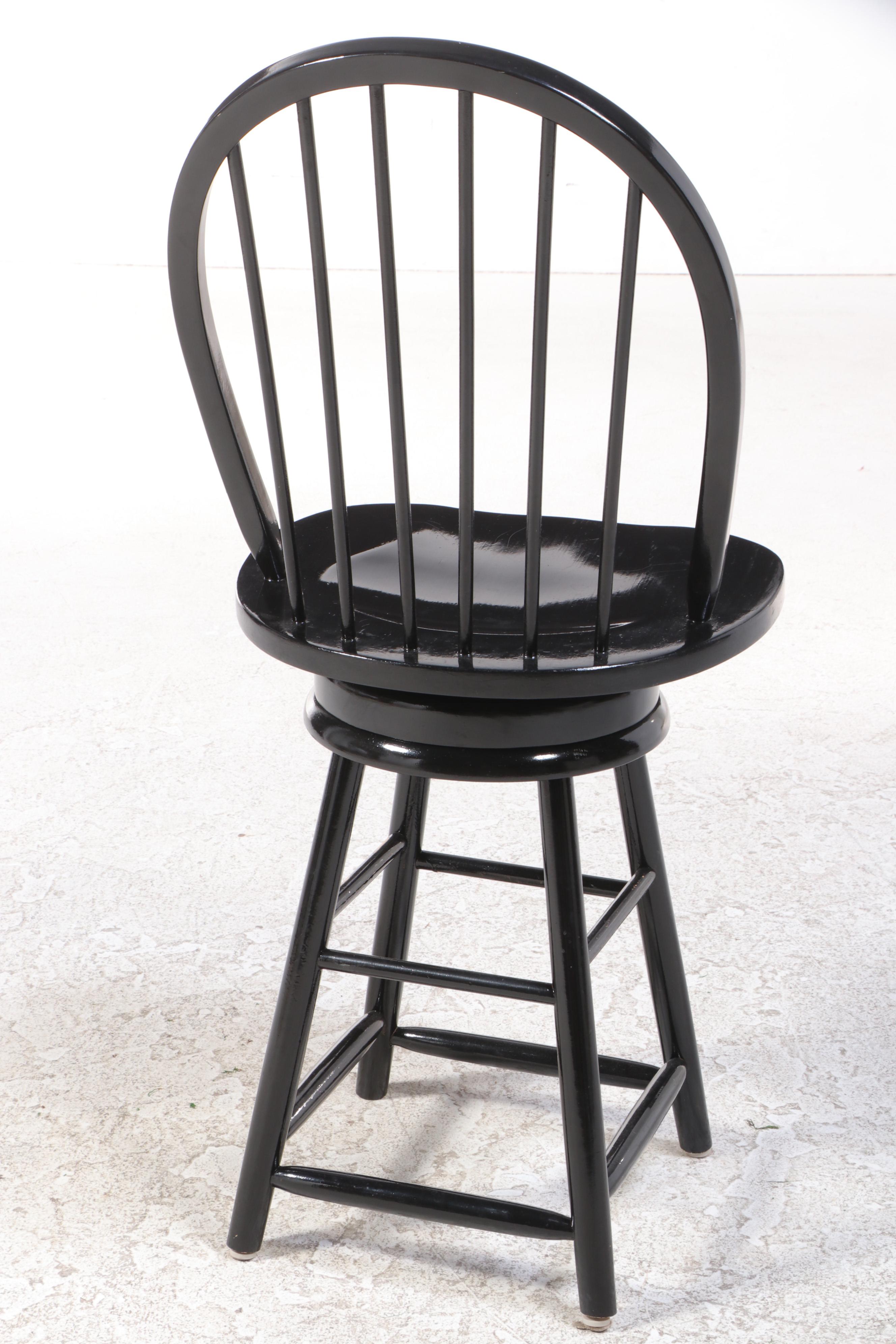Three Windsor Style Ebonized Wood Swivel Barstools