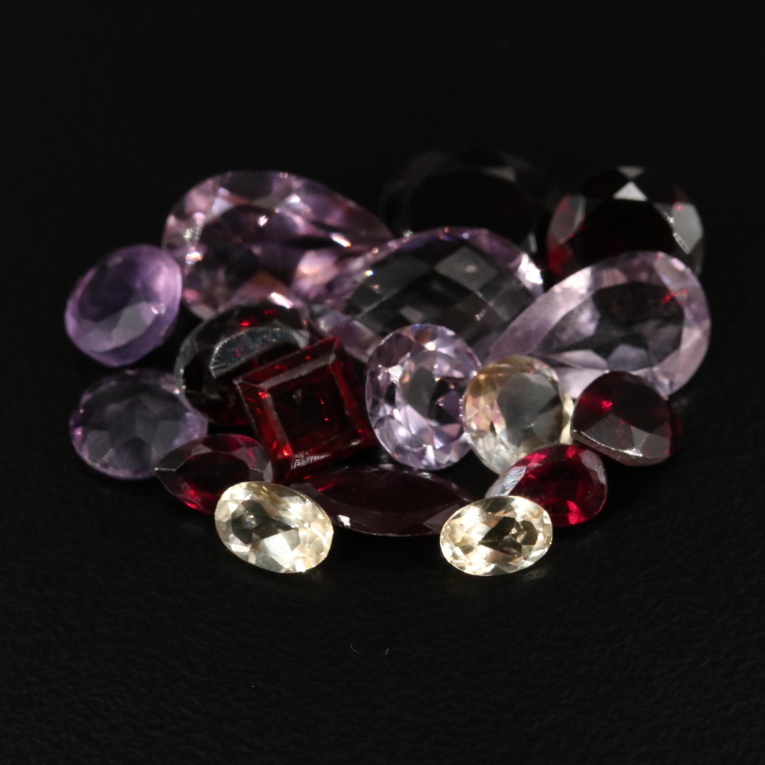 Loose 23.02 CTW Amethyst, Citrine, and Garnet Lot