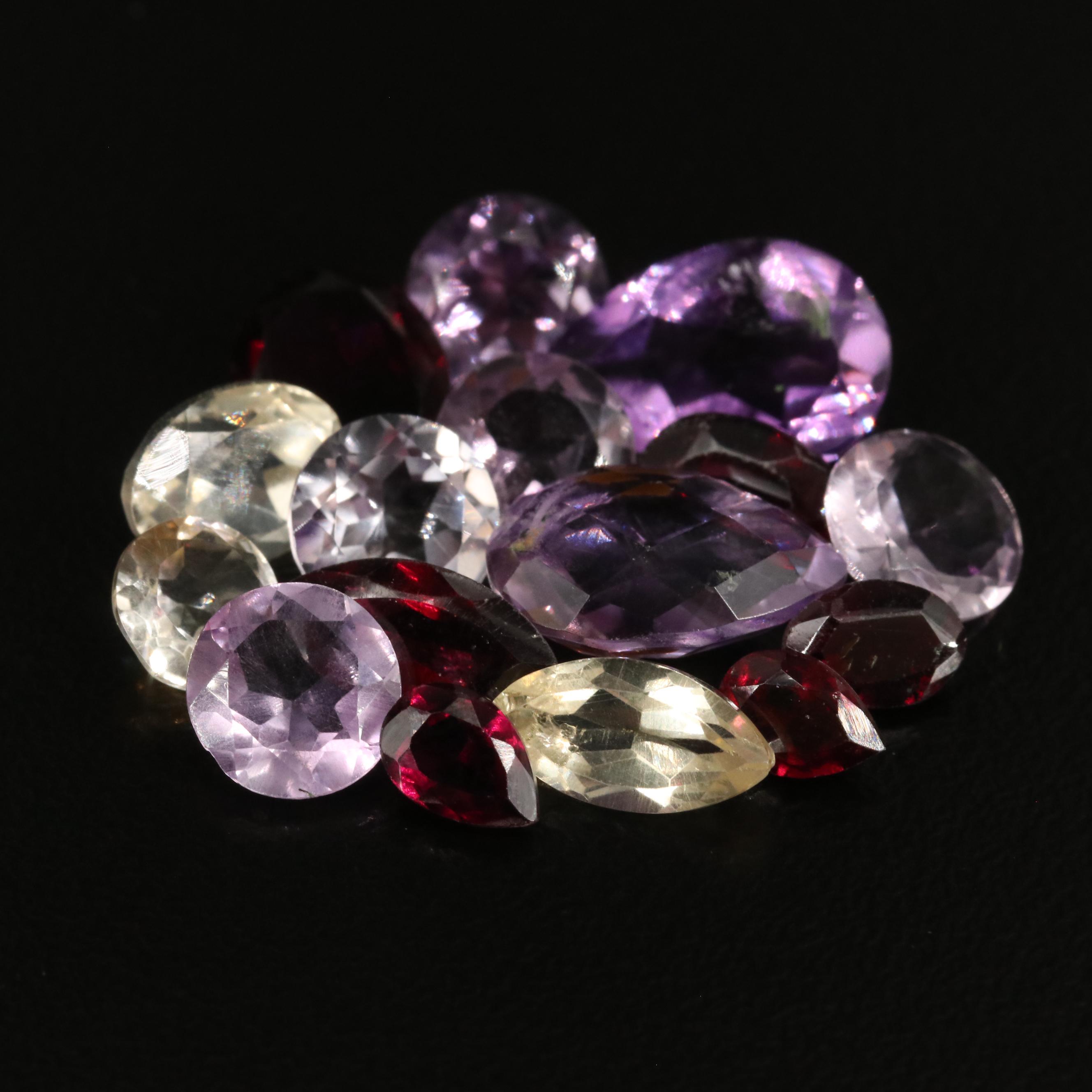 Loose 22.40 CTW Amethyst, Citrine, and Garnet Lot