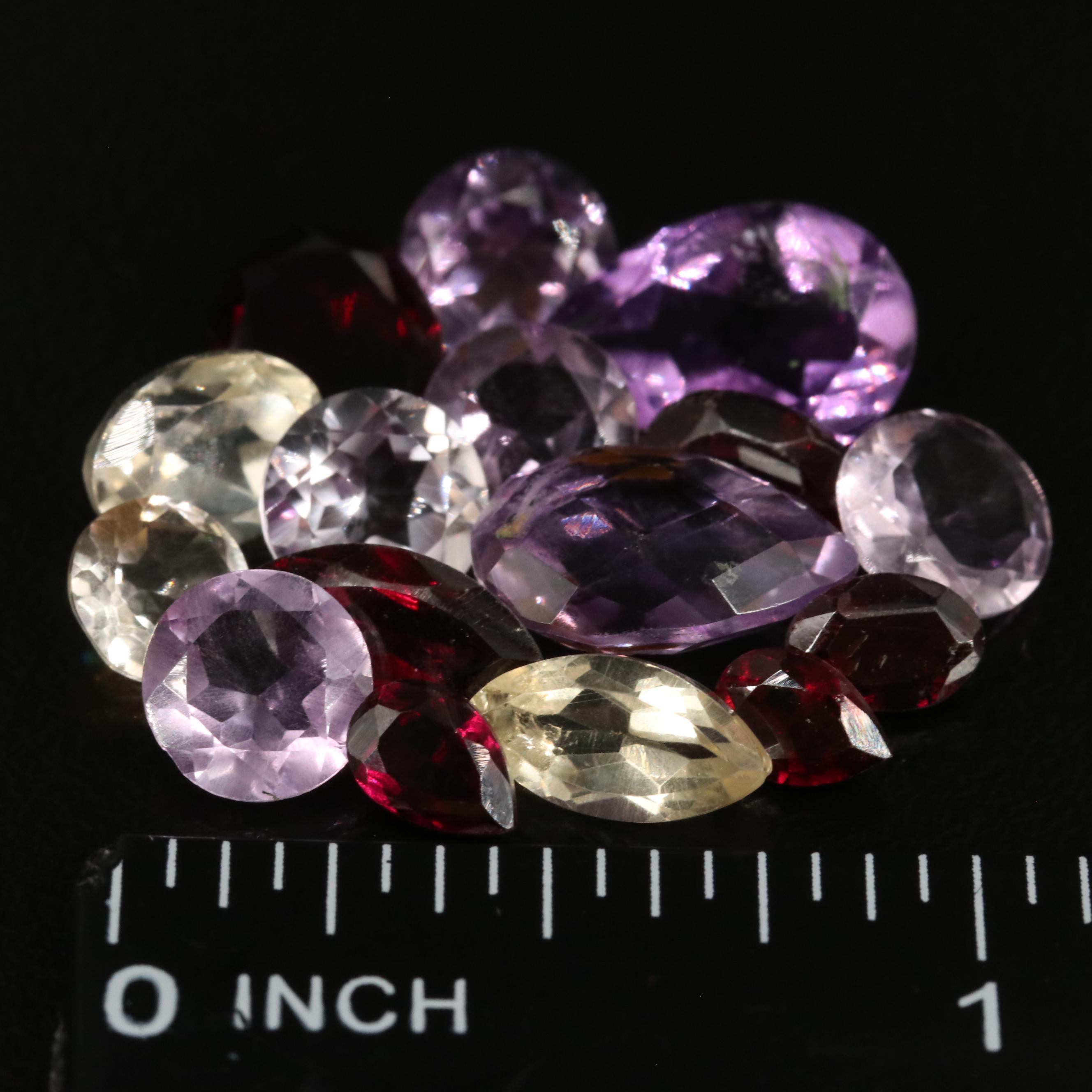 Loose 22.40 CTW Amethyst, Citrine, and Garnet Lot