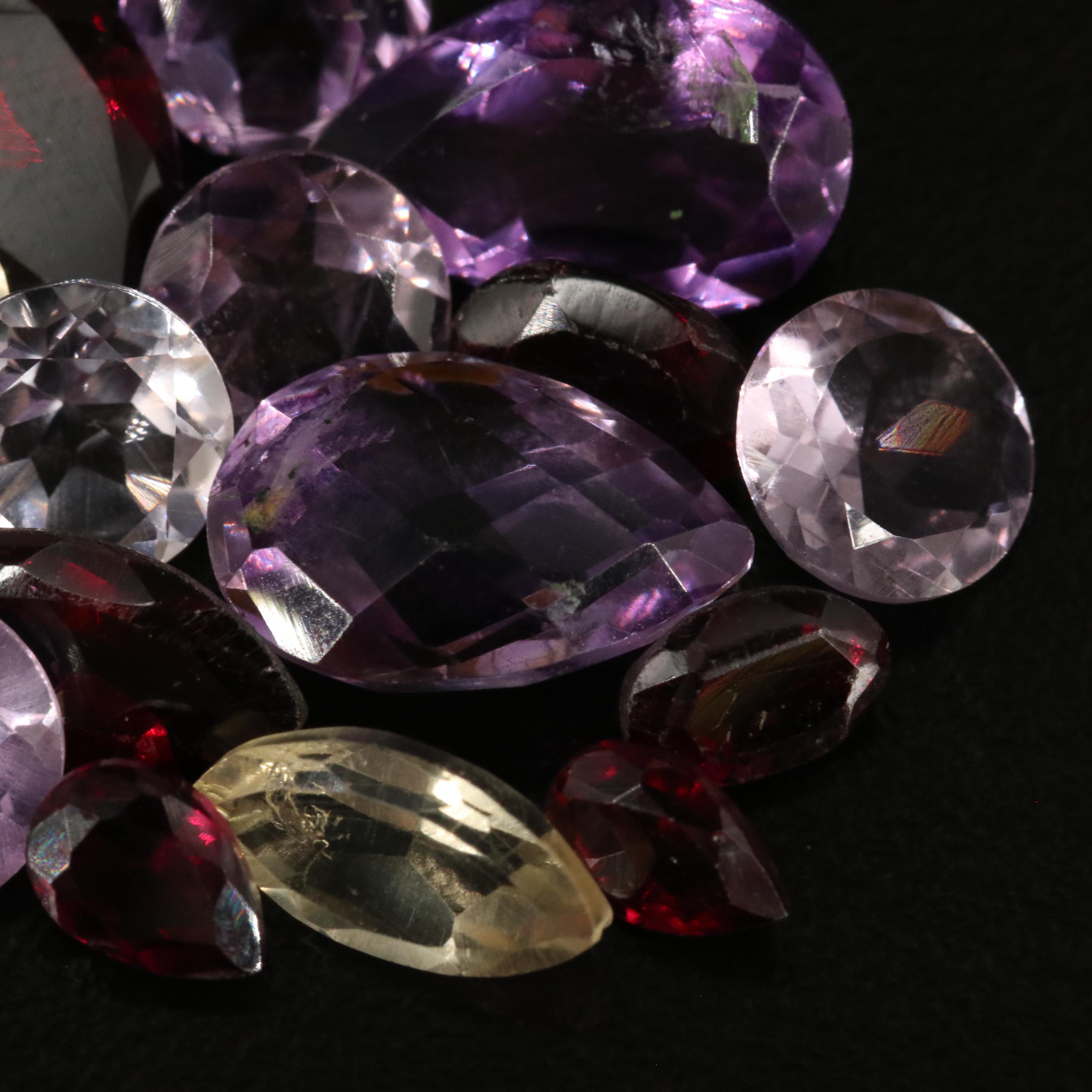 Loose 22.40 CTW Amethyst, Citrine, and Garnet Lot