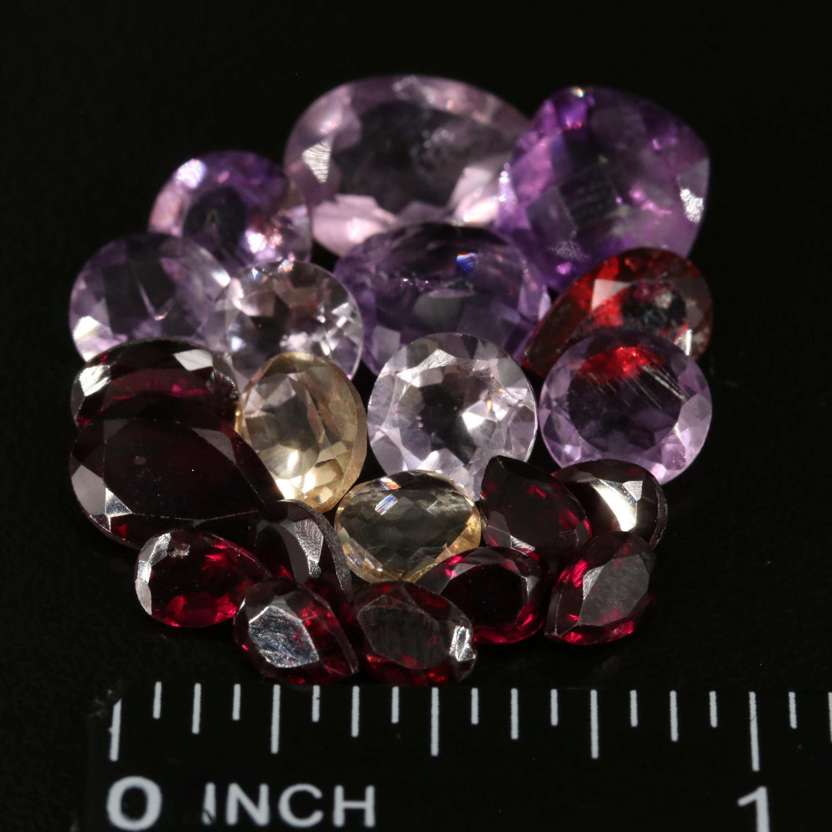 Loose 24.55 CTW Amethyst, Citrine, and Garnet Lot