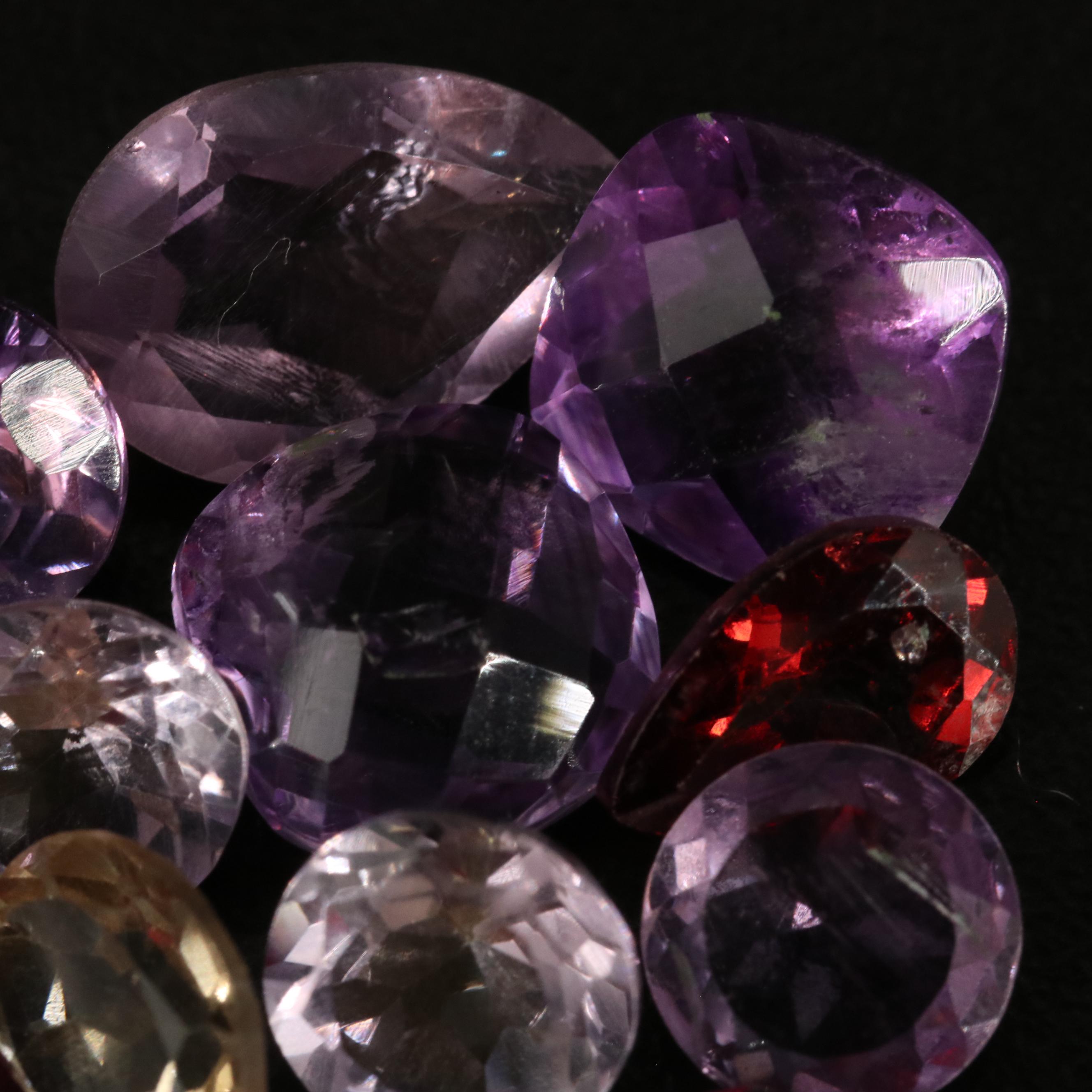 Loose 24.55 CTW Amethyst, Citrine, and Garnet Lot