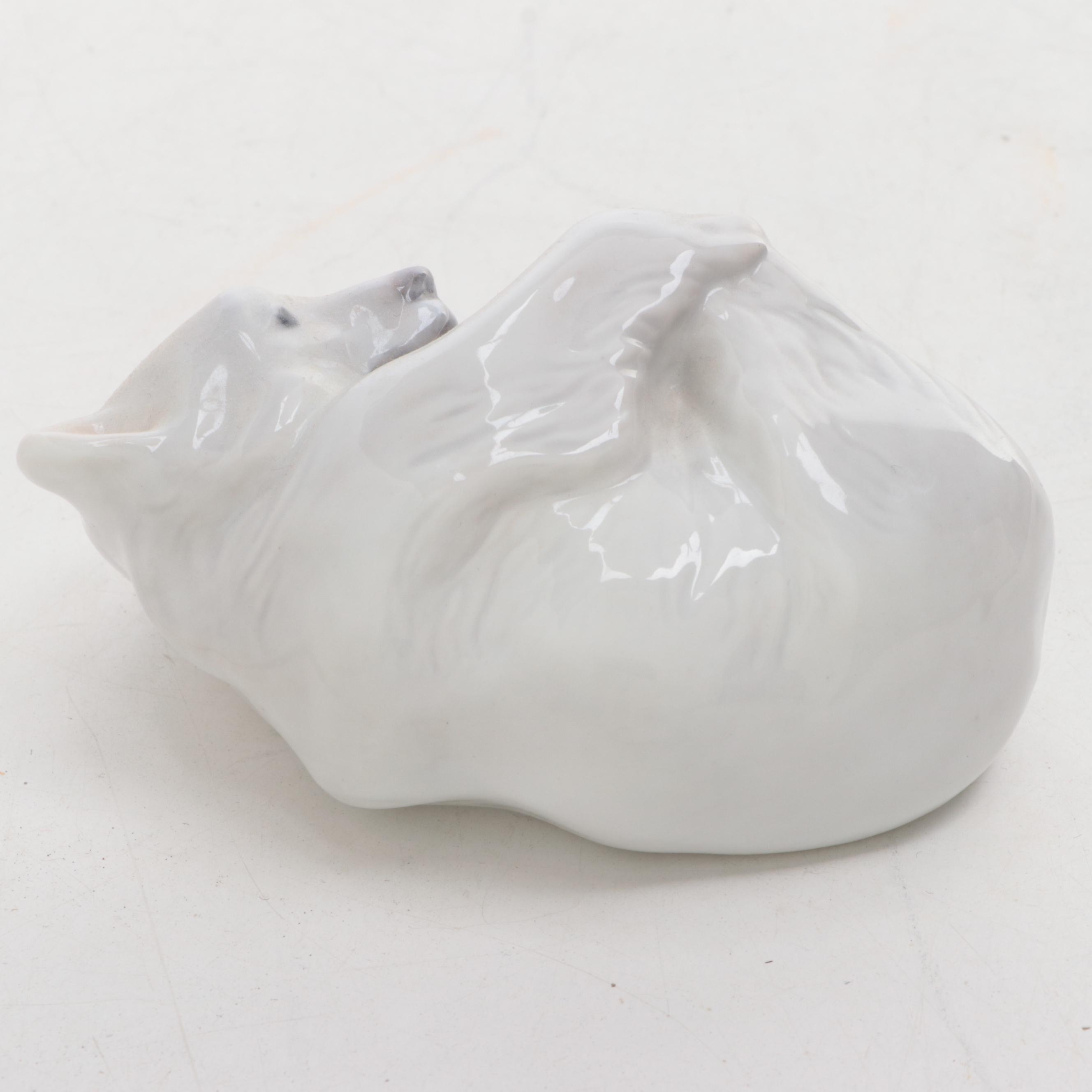 Royal Copenhagen Bear Cub with Lladro Child and Bear Figurines