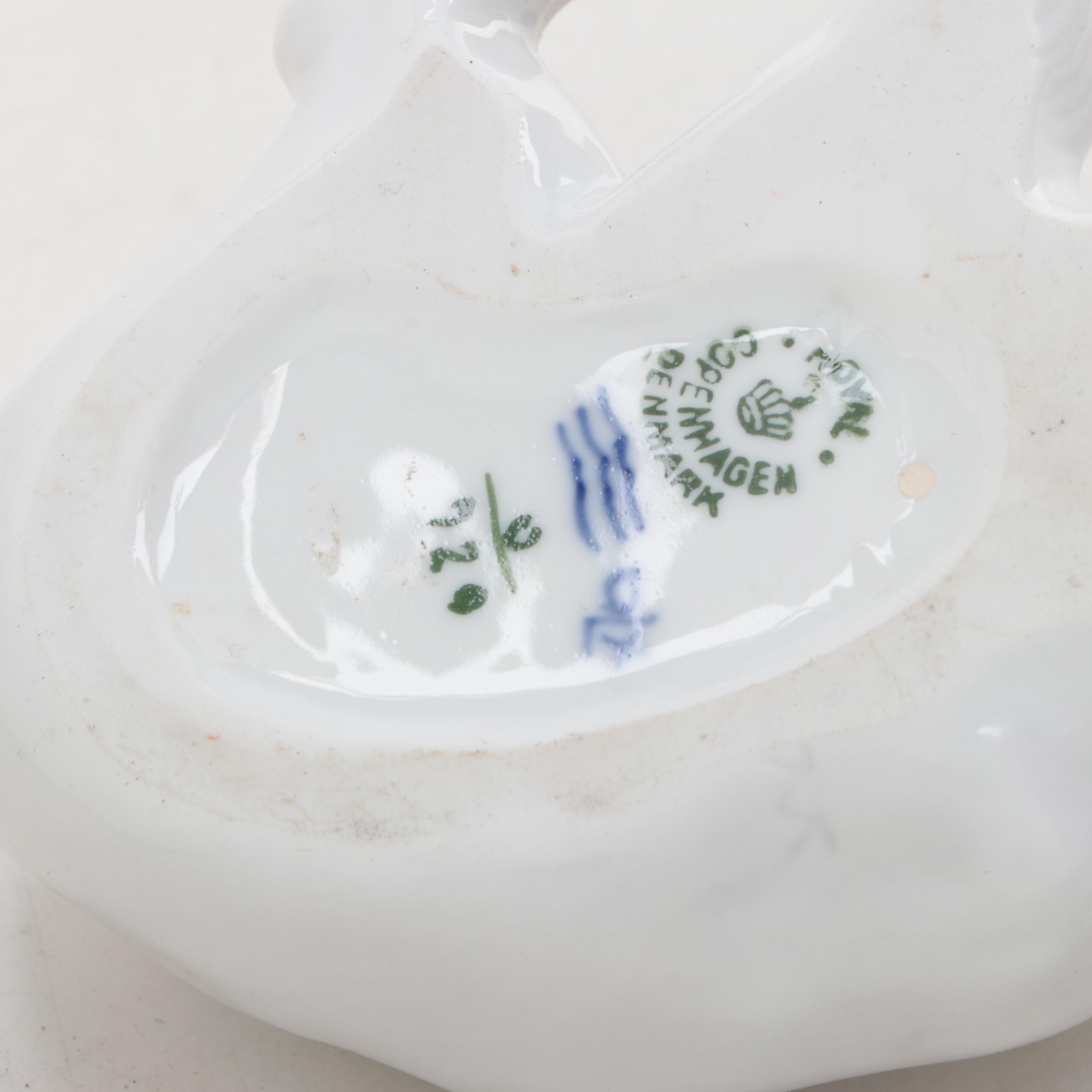 Royal Copenhagen Bear Cub with Lladro Child and Bear Figurines