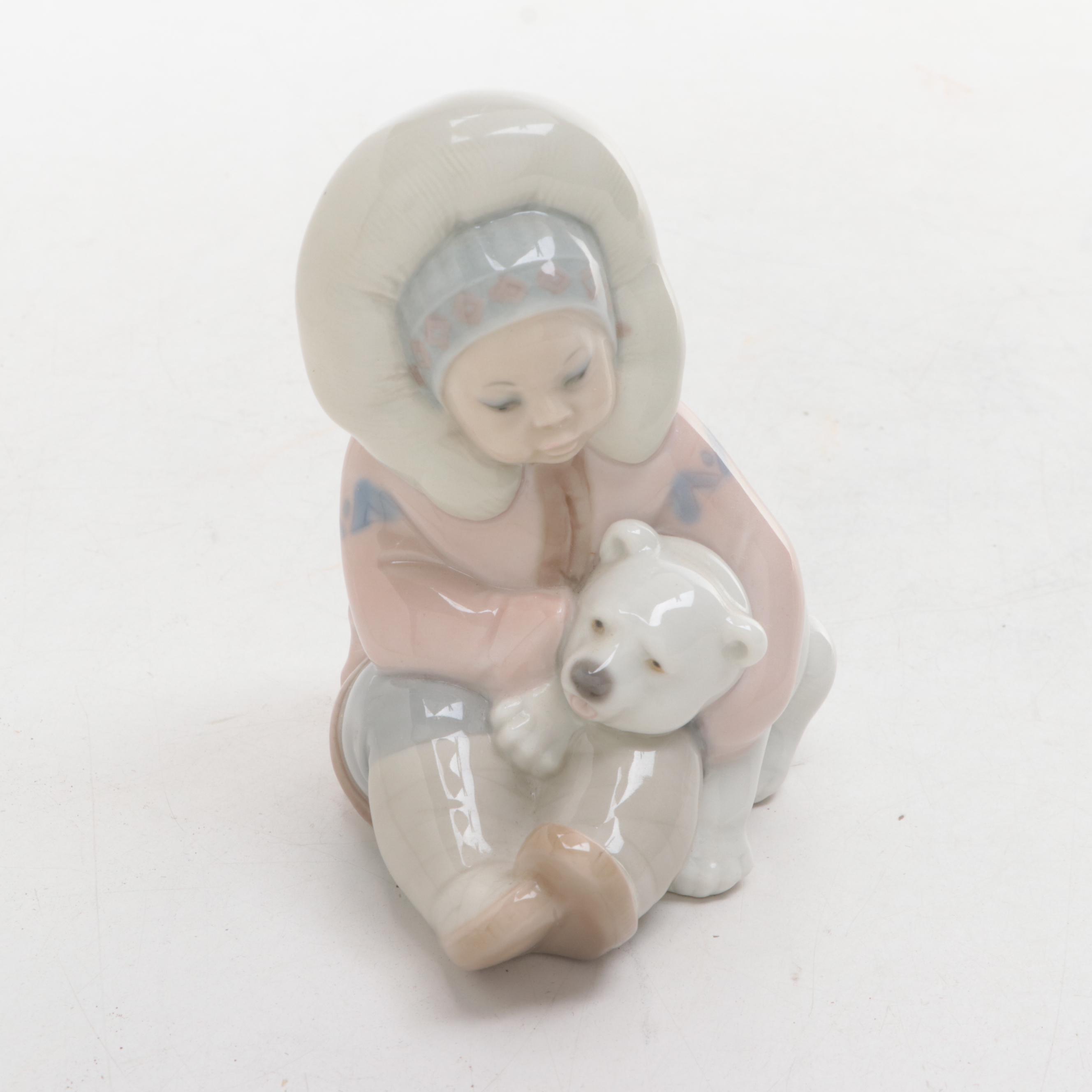 Royal Copenhagen Bear Cub with Lladro Child and Bear Figurines