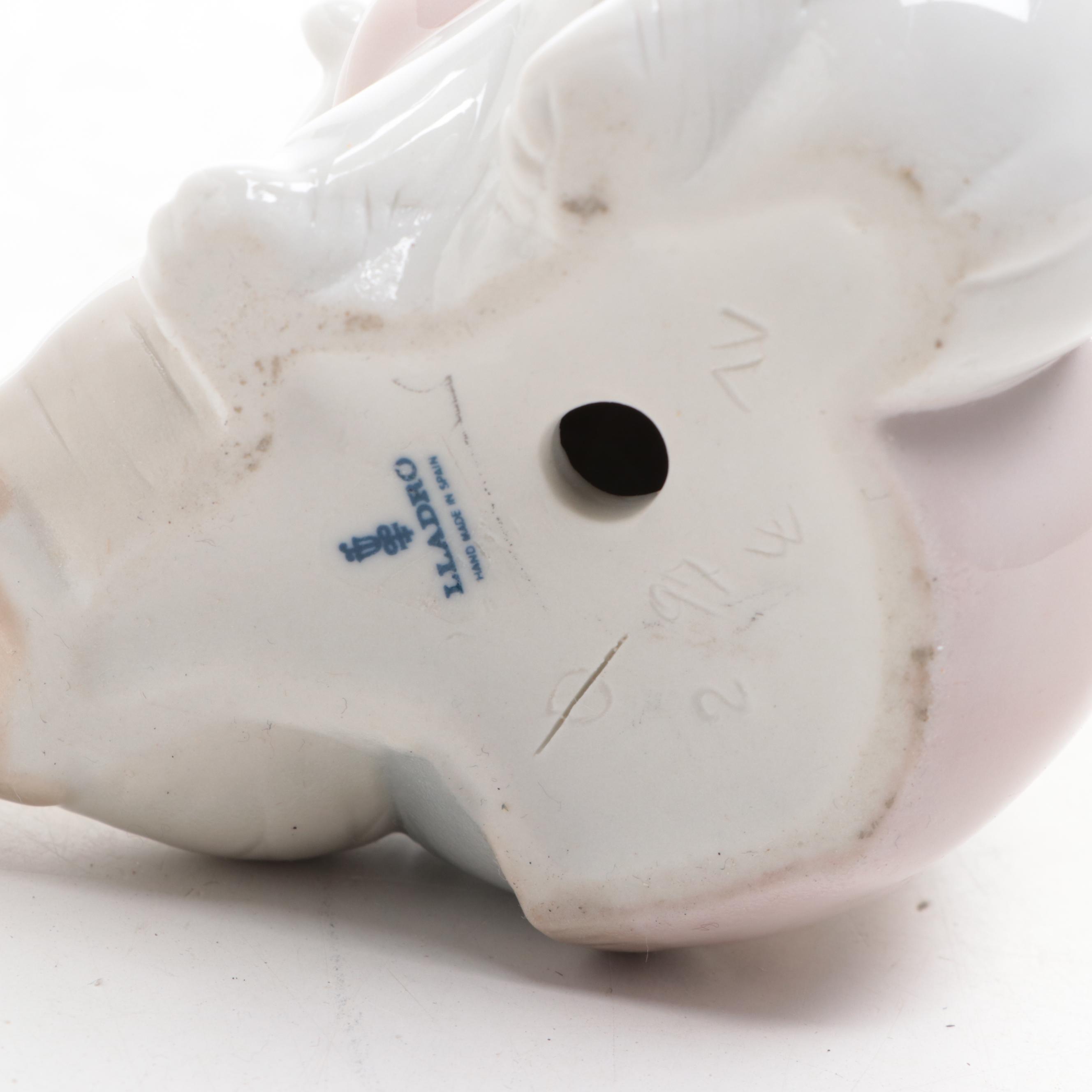 Royal Copenhagen Bear Cub with Lladro Child and Bear Figurines