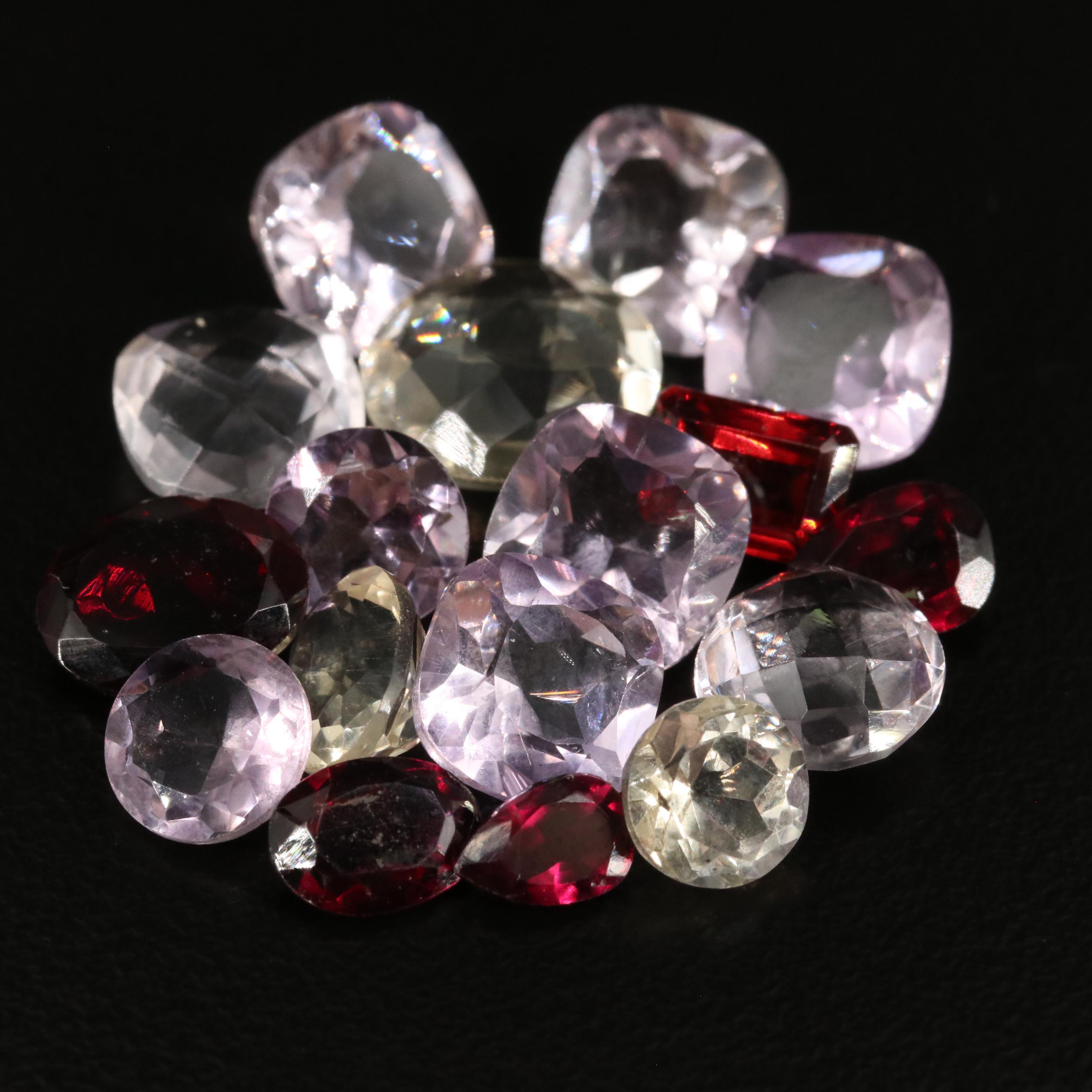 Loose 26.50 CTW Amethyst, Citrine, and Garnet Lot