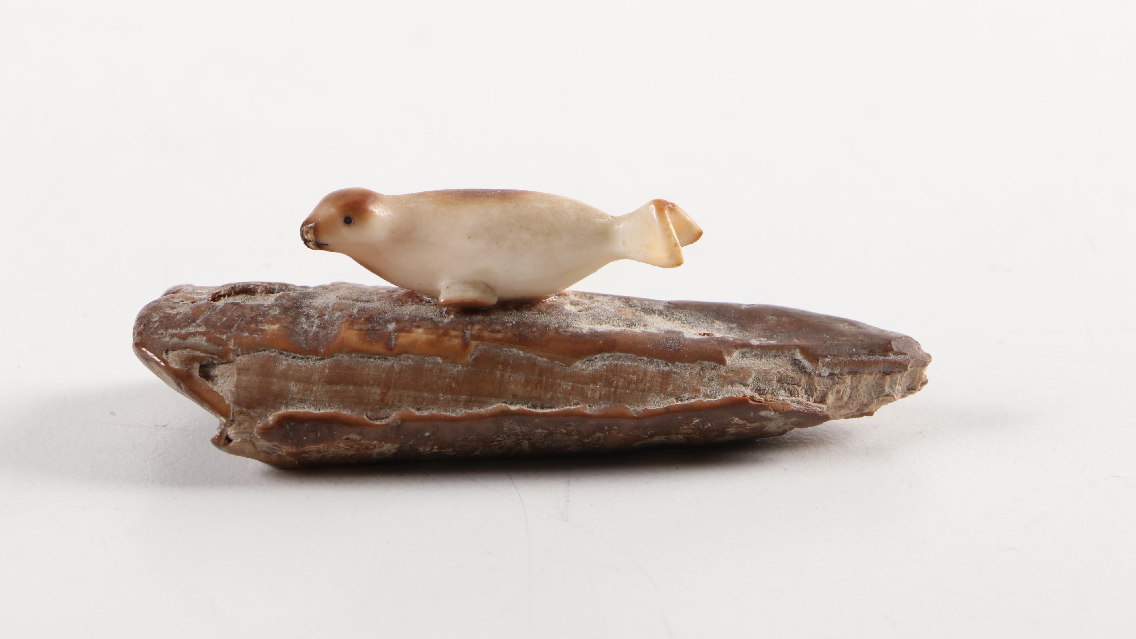 Carved Walrus Ivory Baculum and Walrus Ivory Seal and Walrus Figurines