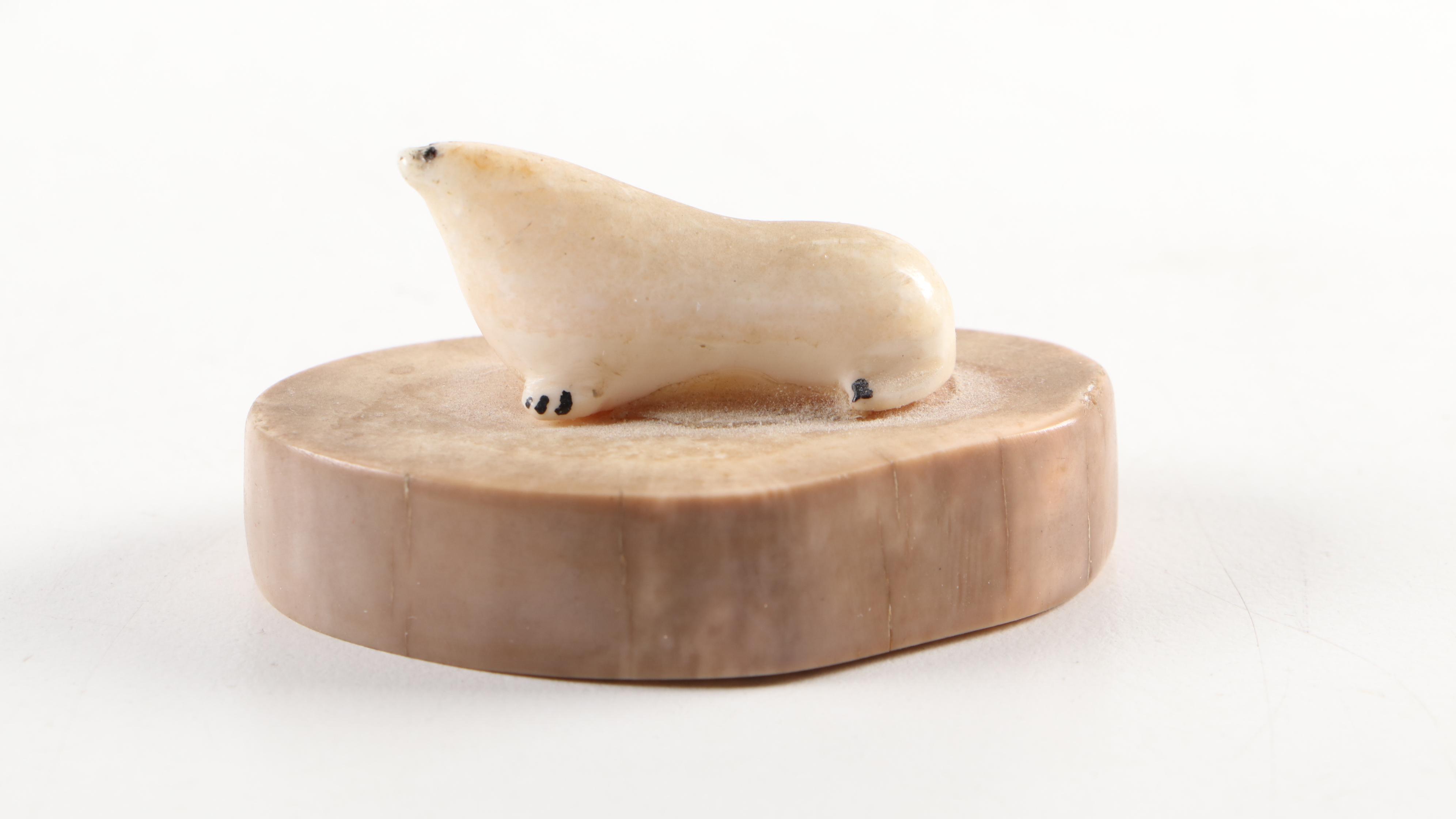 Carved Walrus Ivory Baculum and Walrus Ivory Seal and Walrus Figurines