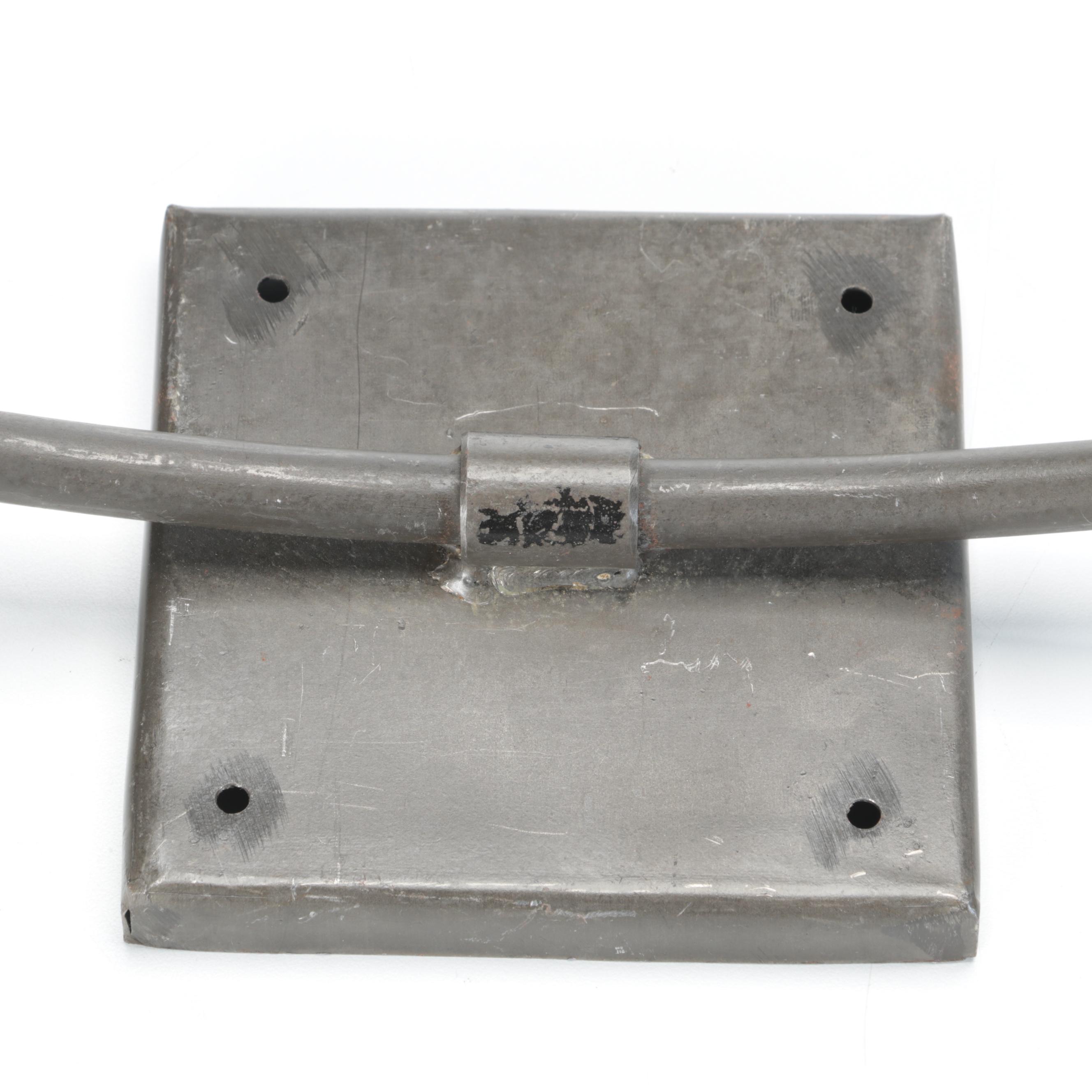 Three Metal Wall Candle Sconces With Pillar Candles