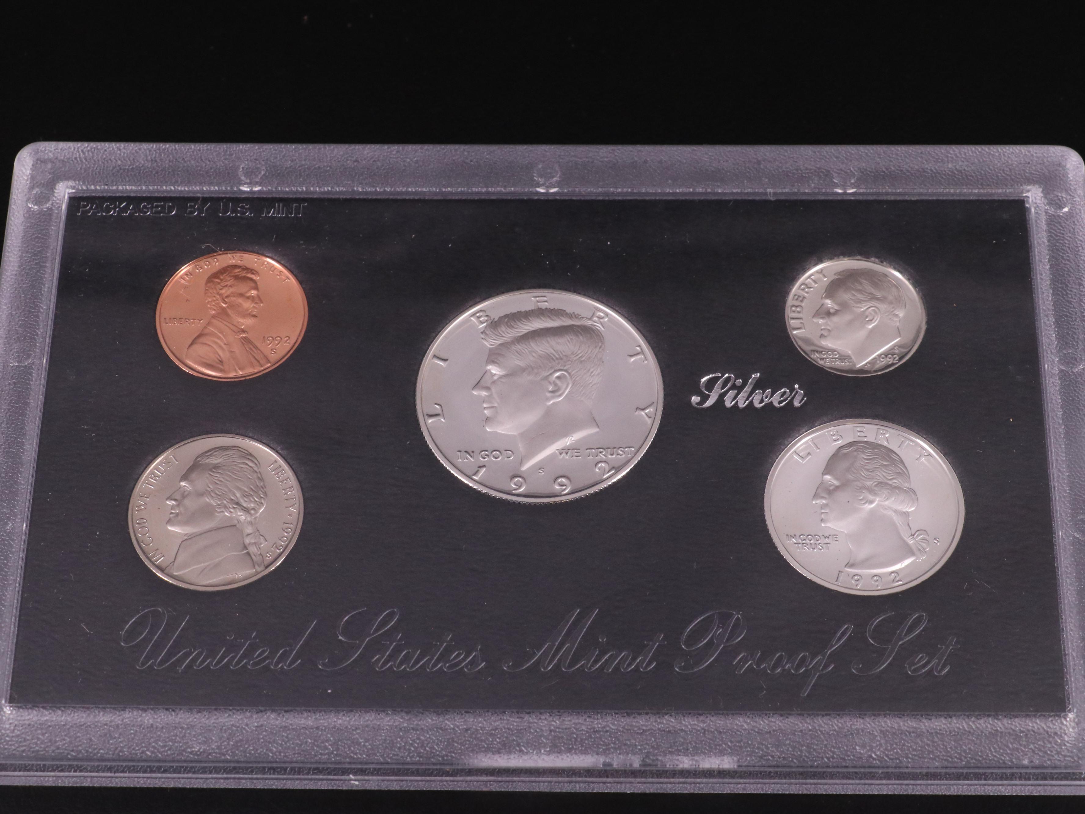 Four U.S. Mint Silver Proof Sets
