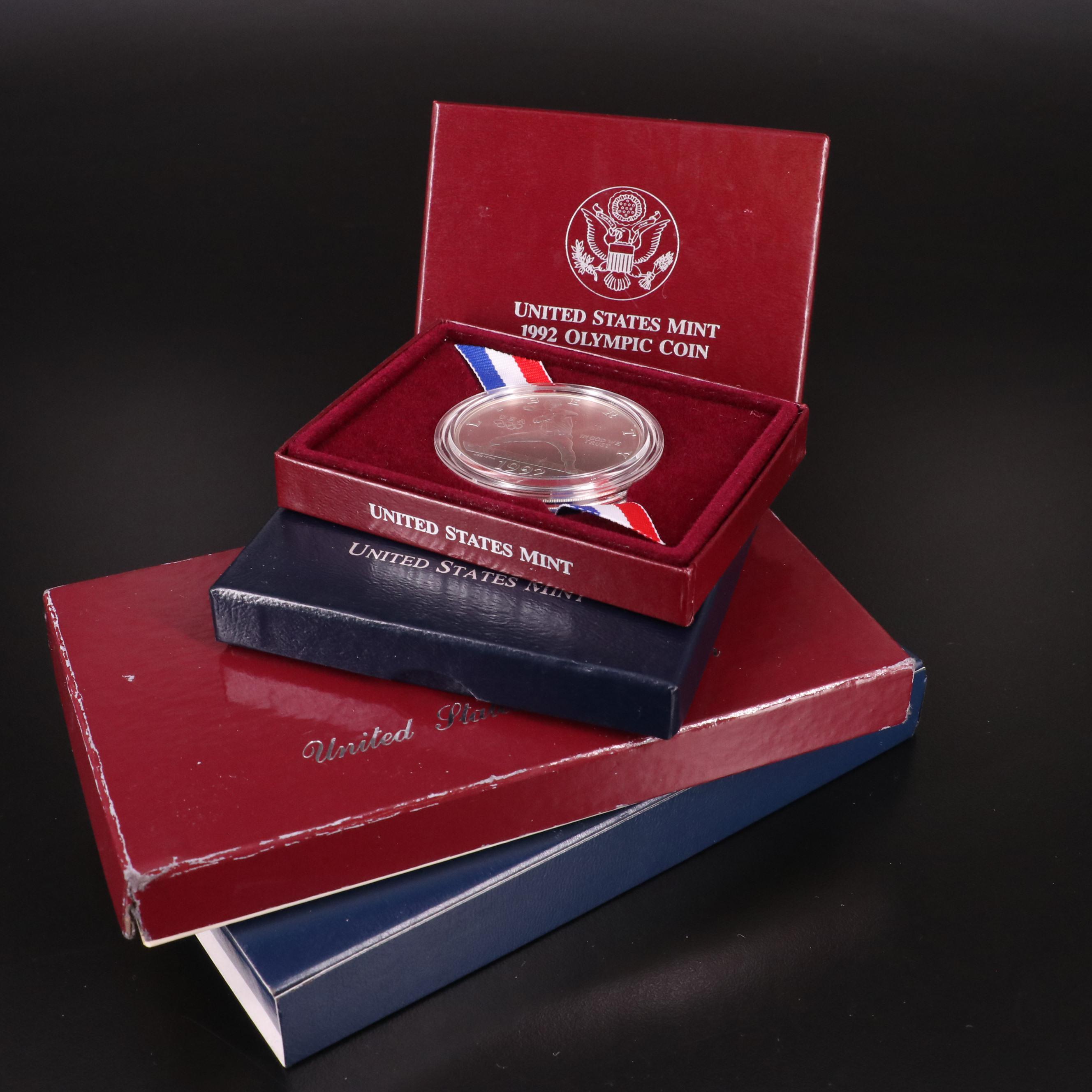 Four Modern Commemorative Olympics Silver Dollars