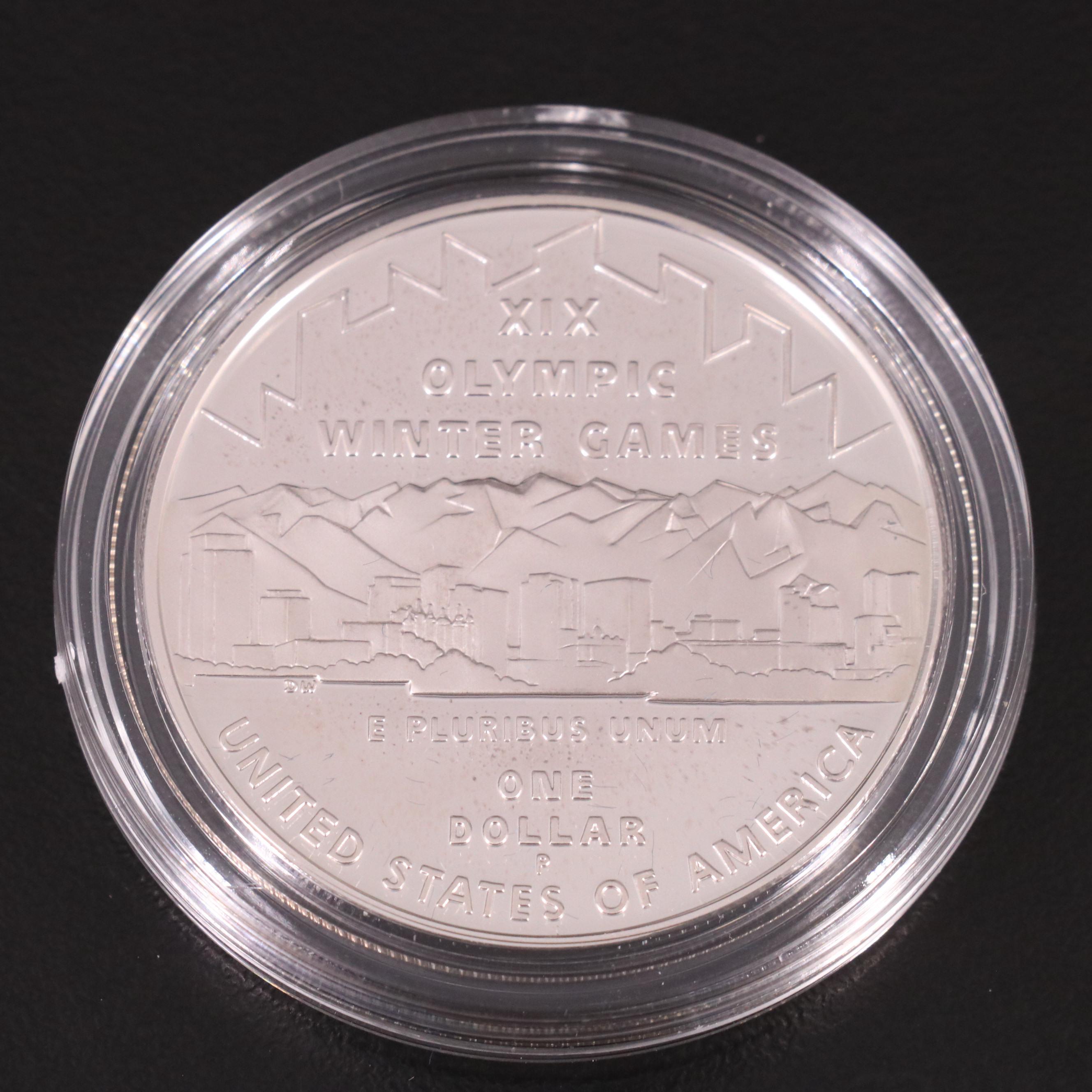 Four Modern Commemorative Olympics Silver Dollars