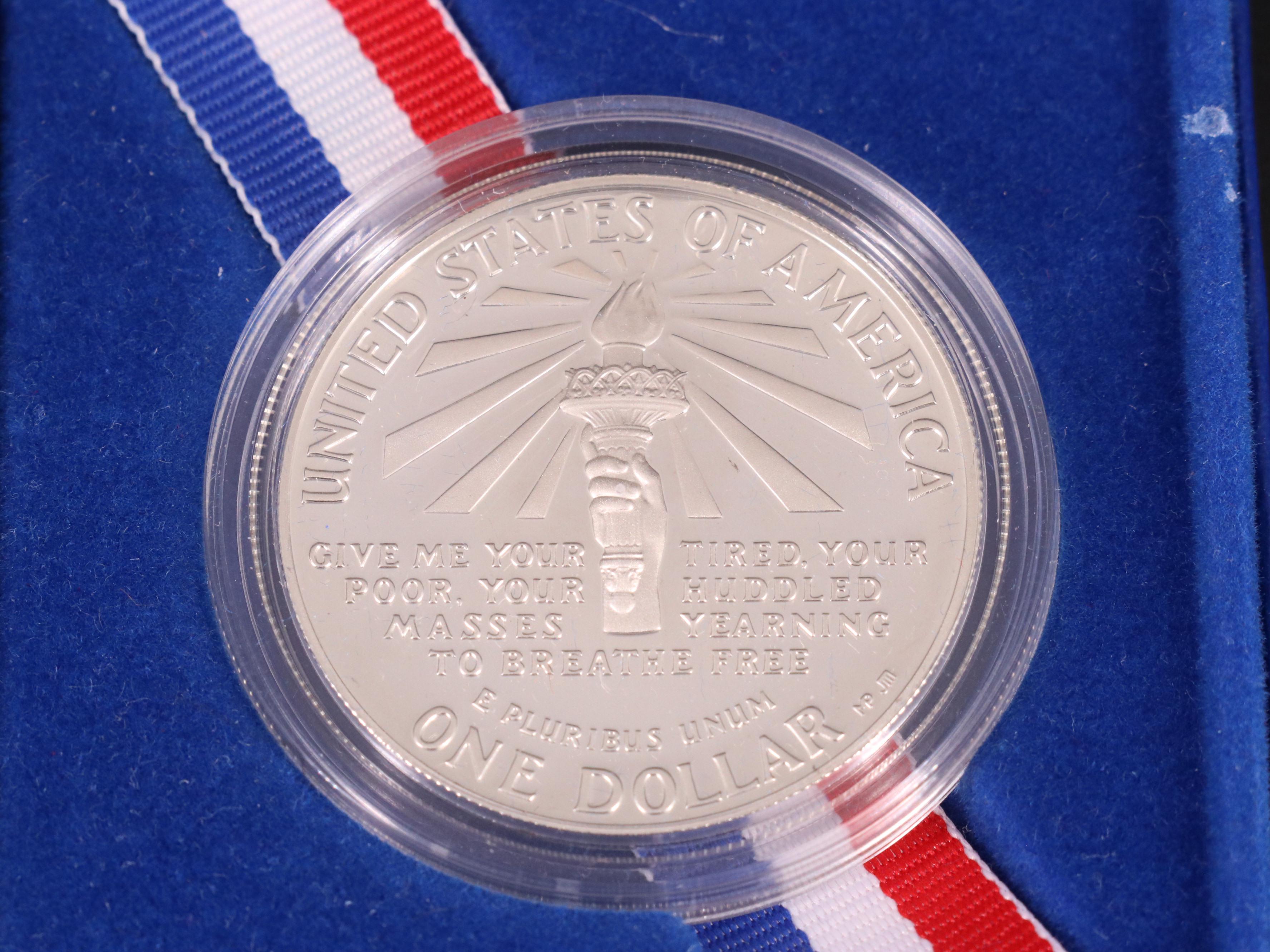 Three Modern Commemorative Silver Dollars