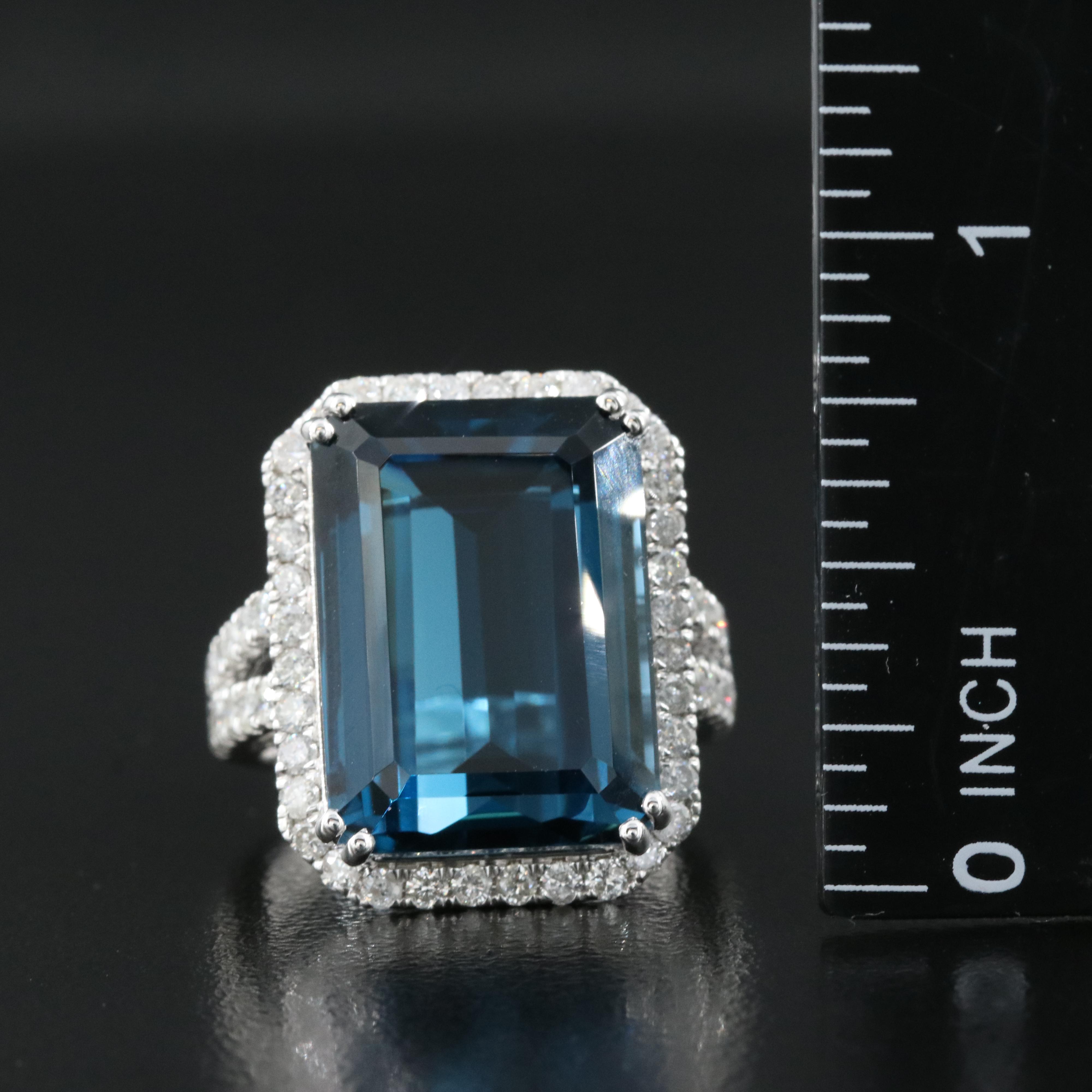14K 21.18 CT London Blue Topaz and 1.35 CTW Diamond Halo Ring